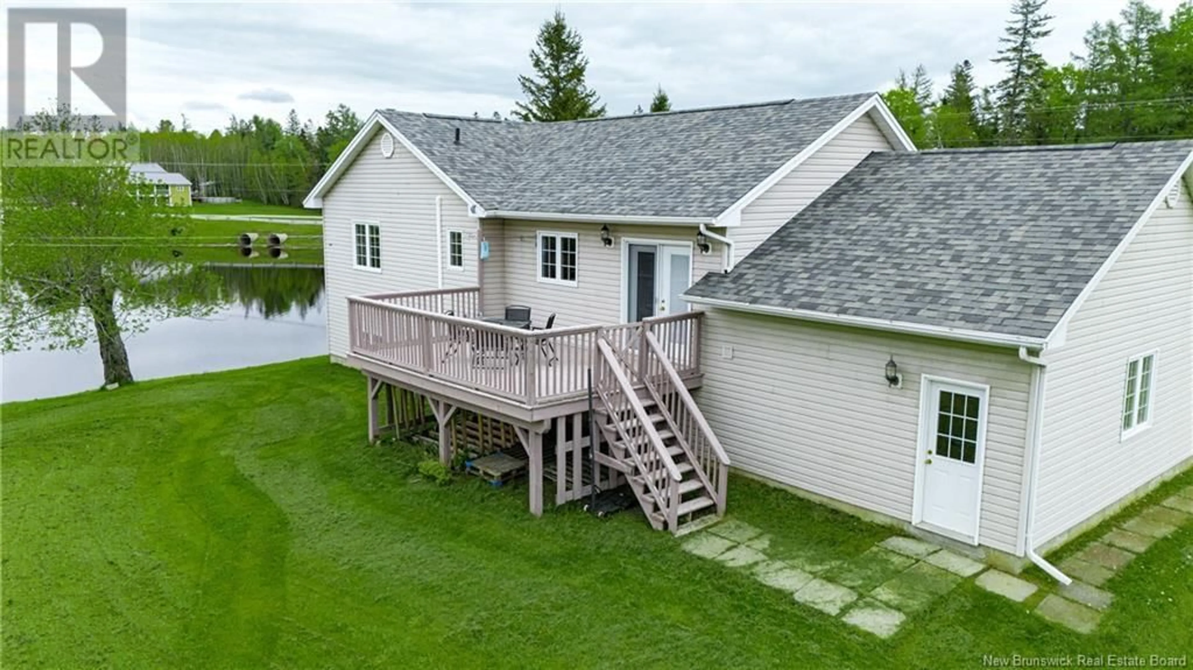 A pic from outside/outdoor area/front of a property/back of a property/a pic from drone, unknown for 71 PORTOBELLO DRIVE, Maugerville New Brunswick E3A8M4