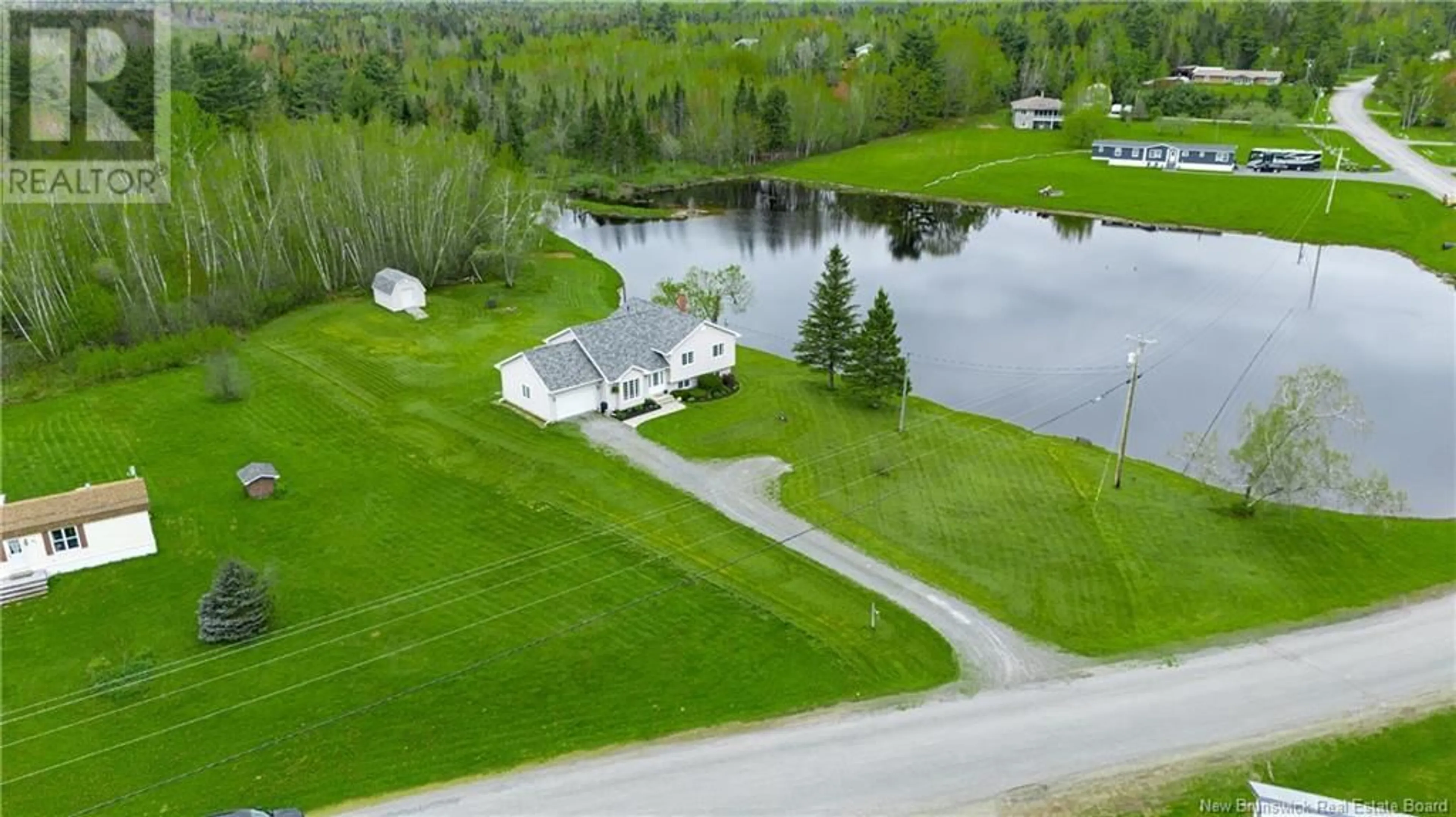 A pic from outside/outdoor area/front of a property/back of a property/a pic from drone, water/lake/river/ocean view for 71 PORTOBELLO DRIVE, Maugerville New Brunswick E3A8M4