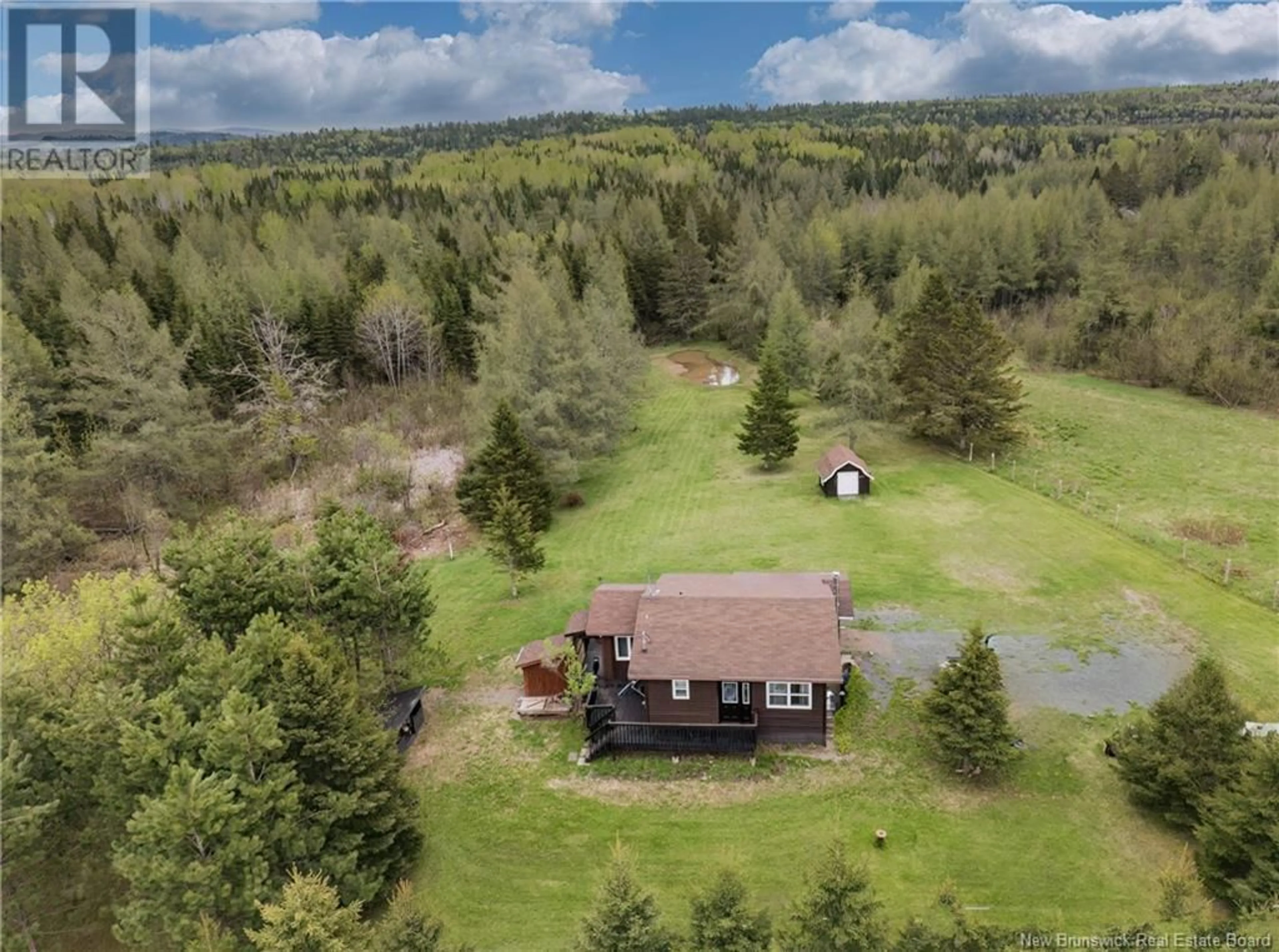 A pic from outside/outdoor area/front of a property/back of a property/a pic from drone, forest/trees view for 1046 ROUTE 385, Burntland Brook New Brunswick E7G3G5