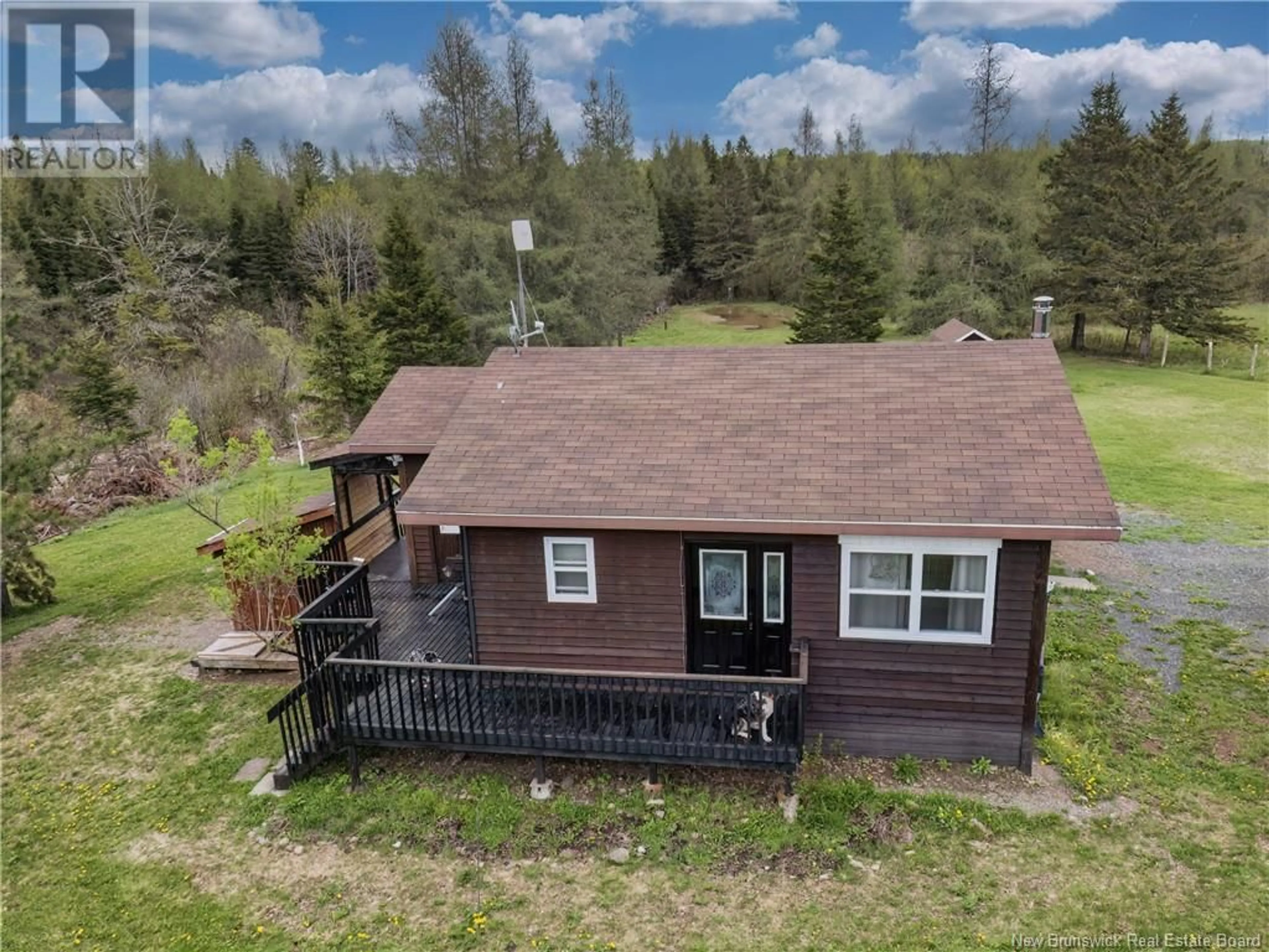 A pic from outside/outdoor area/front of a property/back of a property/a pic from drone, water/lake/river/ocean view for 1046 ROUTE 385, Burntland Brook New Brunswick E7G3G5