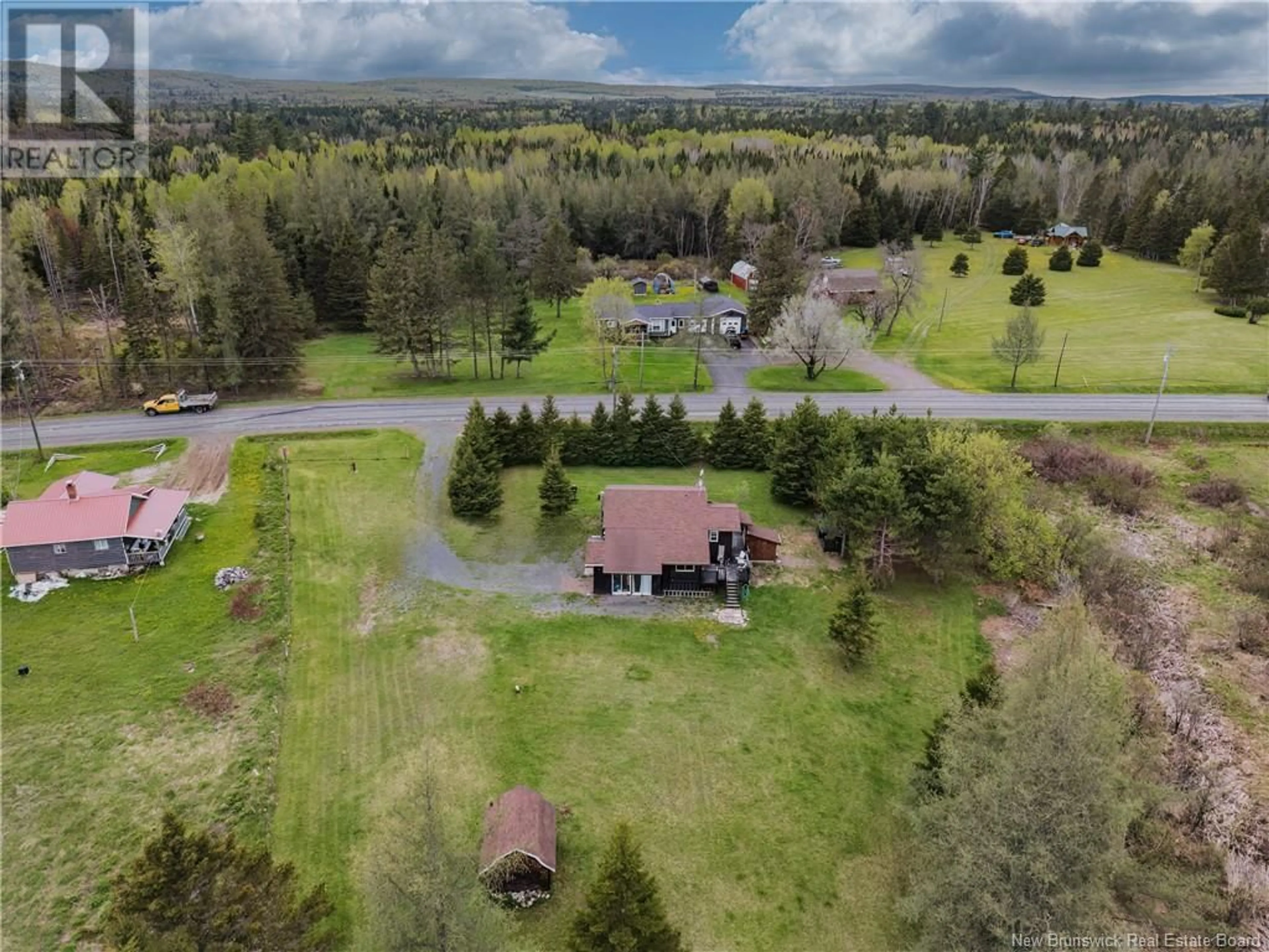 A pic from outside/outdoor area/front of a property/back of a property/a pic from drone, mountain view for 1046 ROUTE 385, Burntland Brook New Brunswick E7G3G5