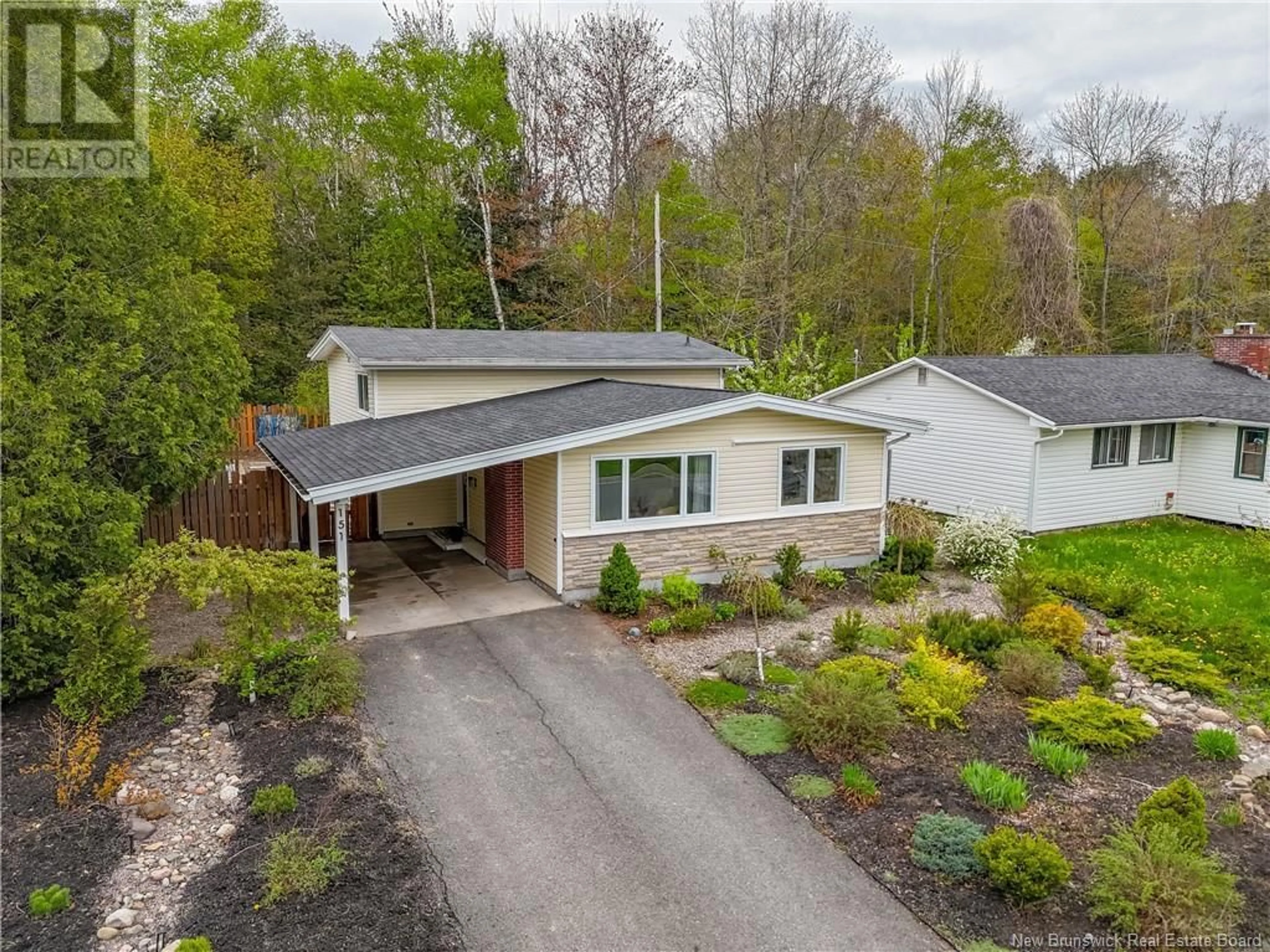 A pic from outside/outdoor area/front of a property/back of a property/a pic from drone, street for 151 BEECHWOOD CRESCENT, Fredericton New Brunswick E3B2S9