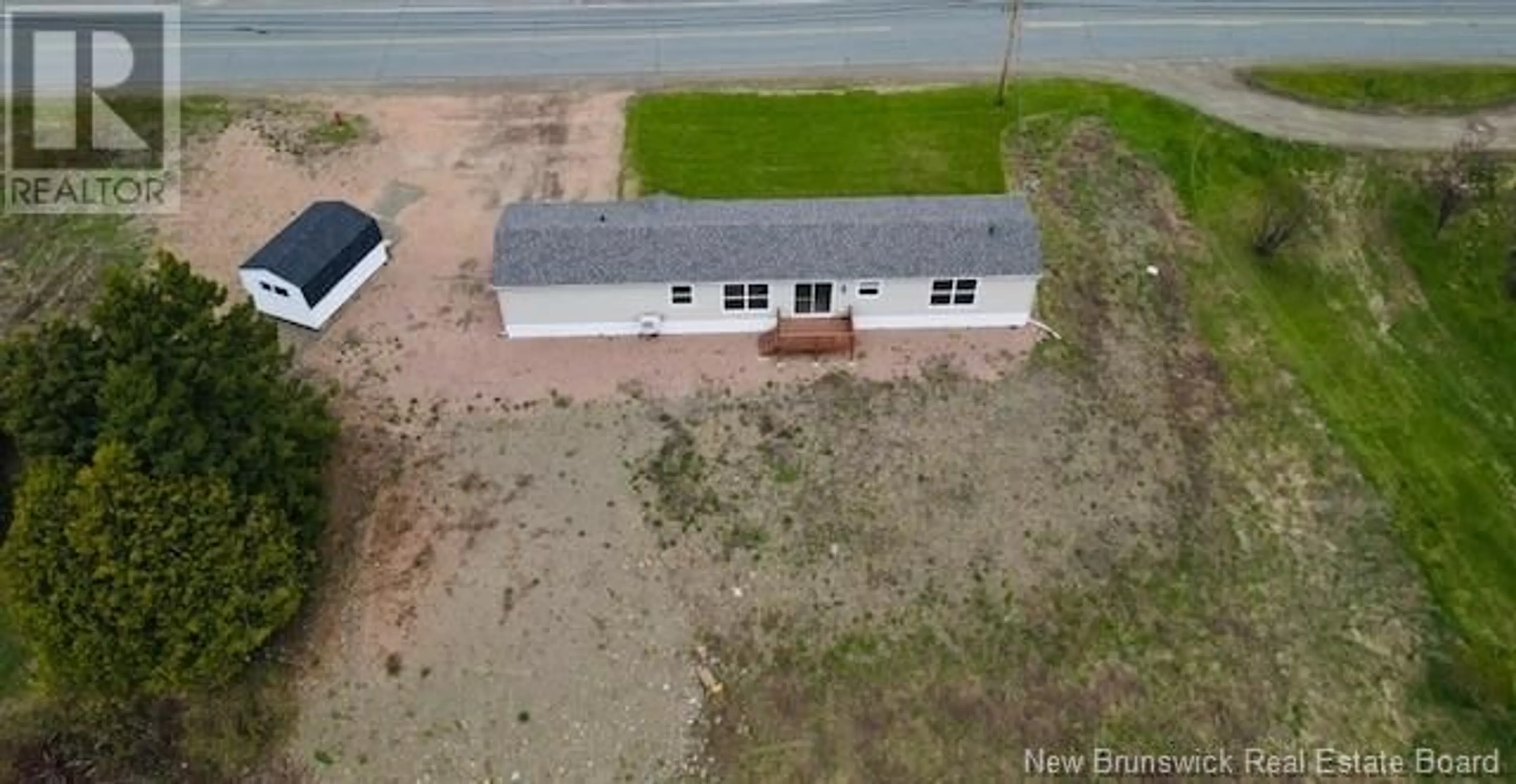 A pic from outside/outdoor area/front of a property/back of a property/a pic from drone, building for 1352 DES PIONNIERS AVENUE, Balmoral New Brunswick E8E1E8