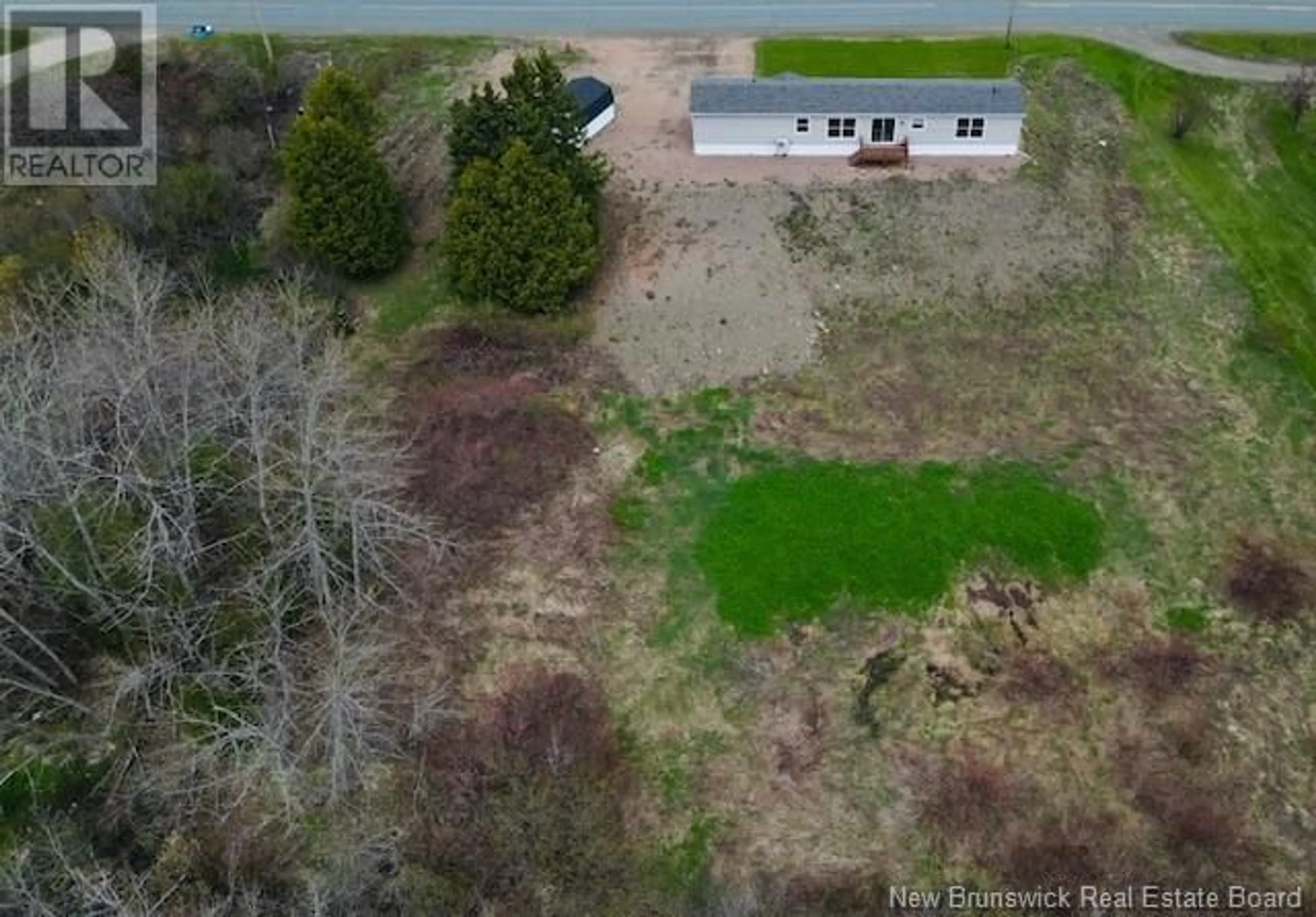 A pic from outside/outdoor area/front of a property/back of a property/a pic from drone, water/lake/river/ocean view for 1352 DES PIONNIERS AVENUE, Balmoral New Brunswick E8E1E8