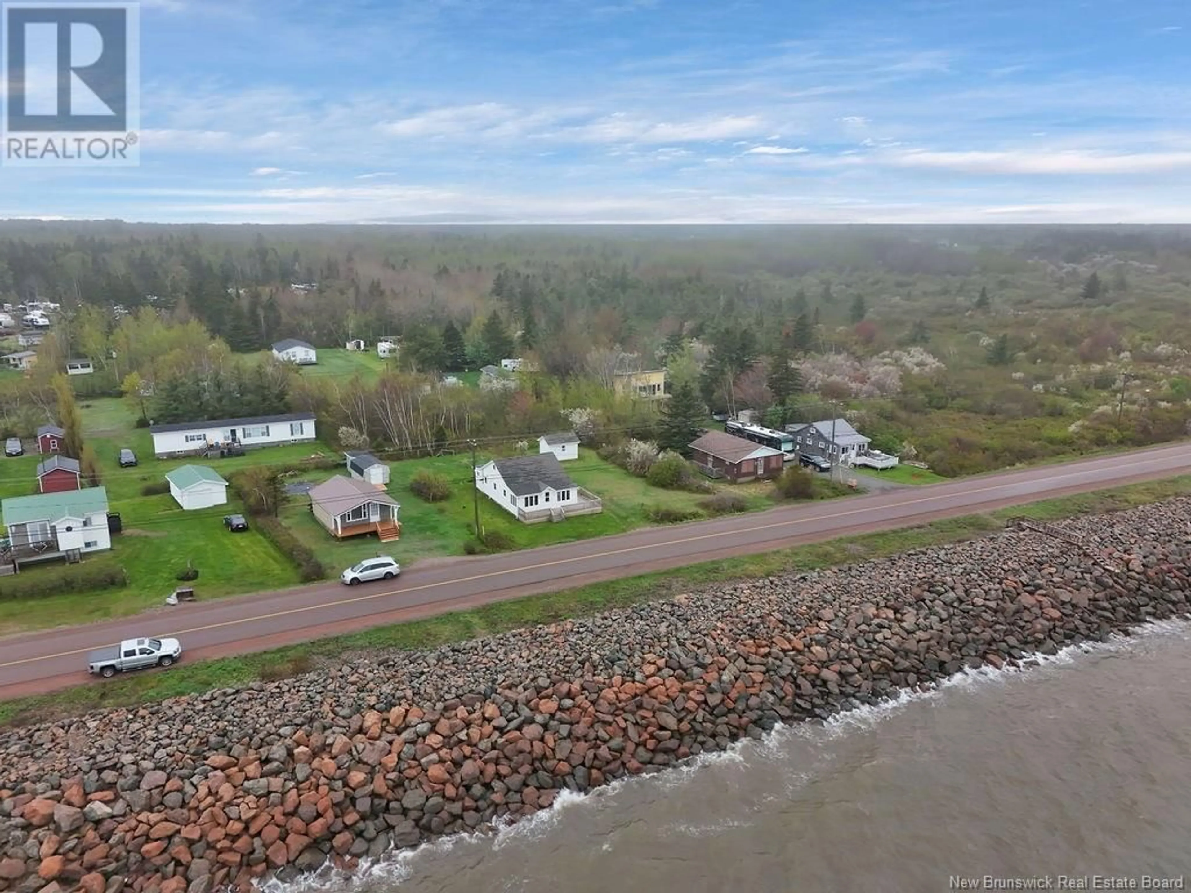 A pic from outside/outdoor area/front of a property/back of a property/a pic from drone, water/lake/river/ocean view for 2523 ROUTE 530, Grande-Digue New Brunswick E4R5J3
