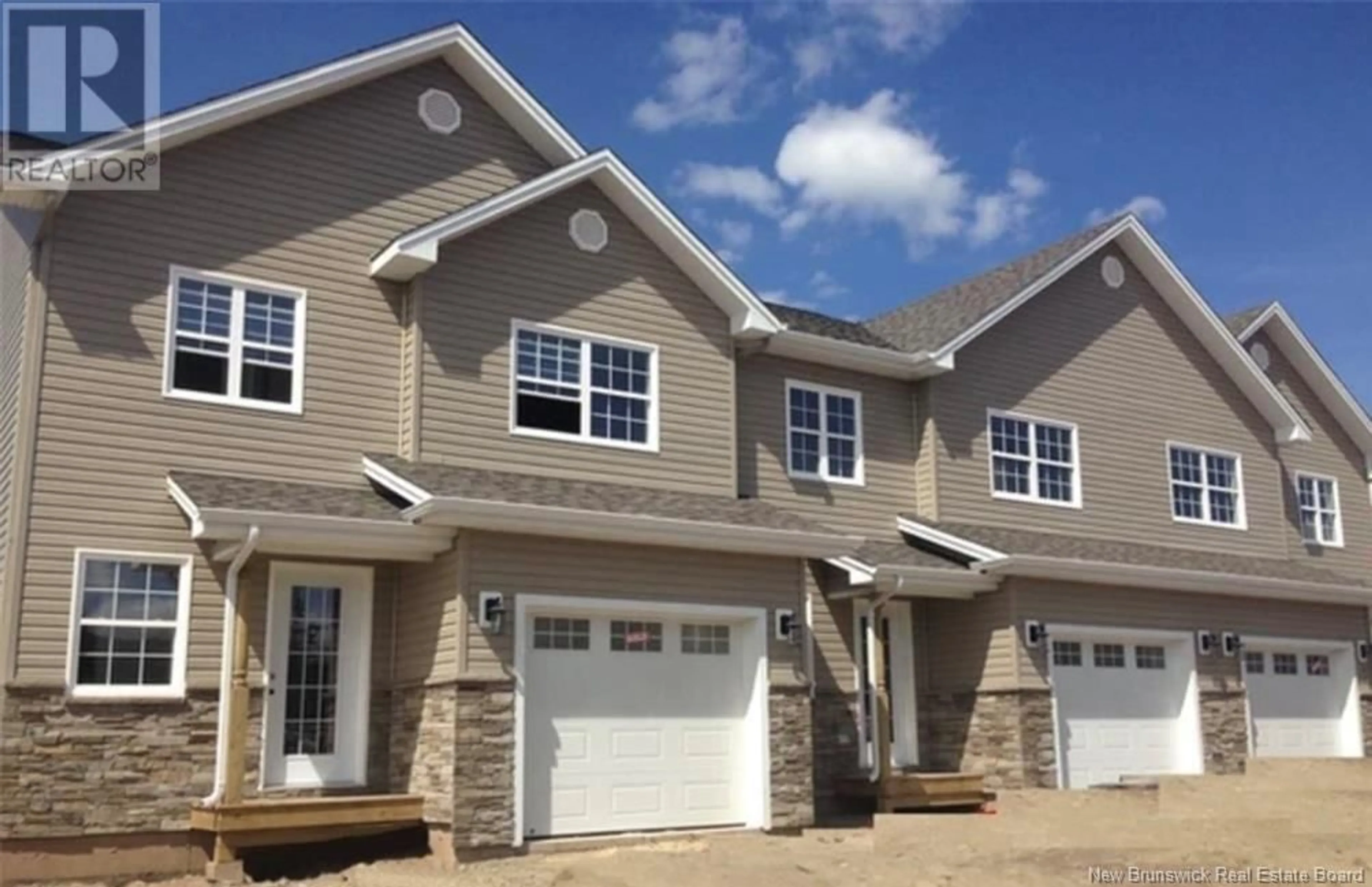 Home with vinyl exterior material, street for 52 ROCHEFORT, Dieppe New Brunswick E1A6S4