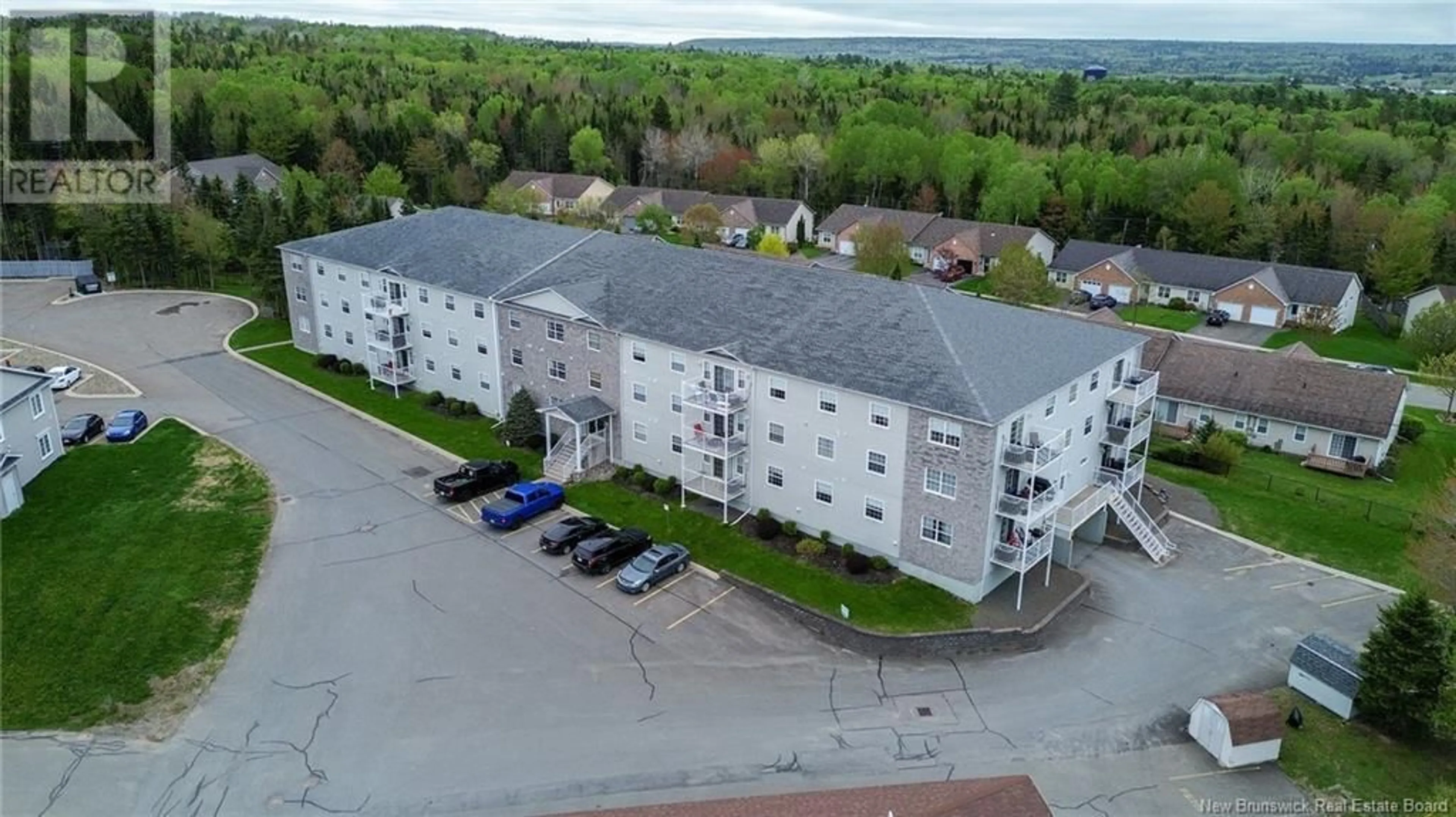 A pic from outside/outdoor area/front of a property/back of a property/a pic from drone, building for 303 - 40 BROWN BOULEVARD, Fredericton New Brunswick E3A0L7