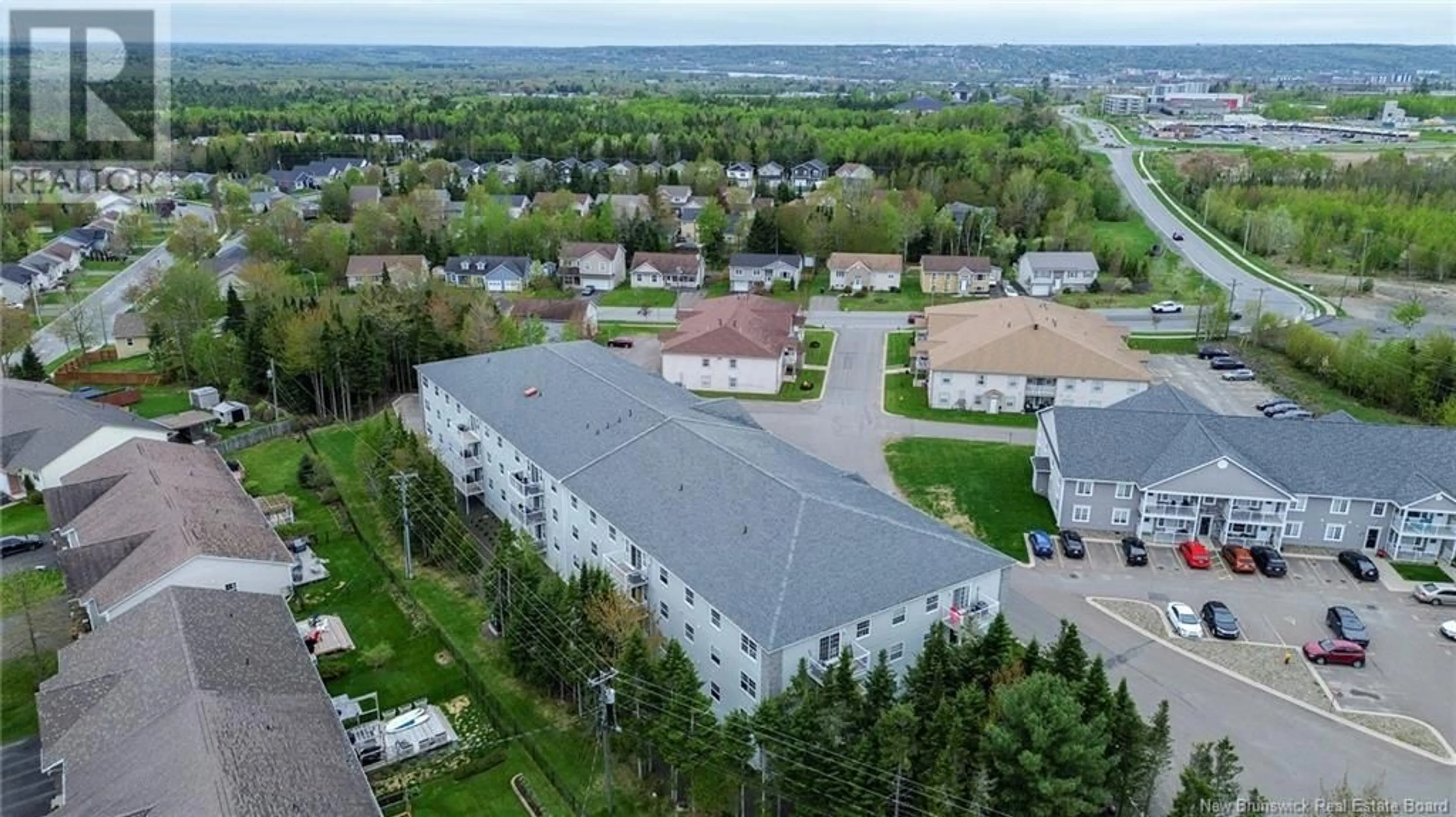 A pic from outside/outdoor area/front of a property/back of a property/a pic from drone, unknown for 303 - 40 BROWN BOULEVARD, Fredericton New Brunswick E3A0L7