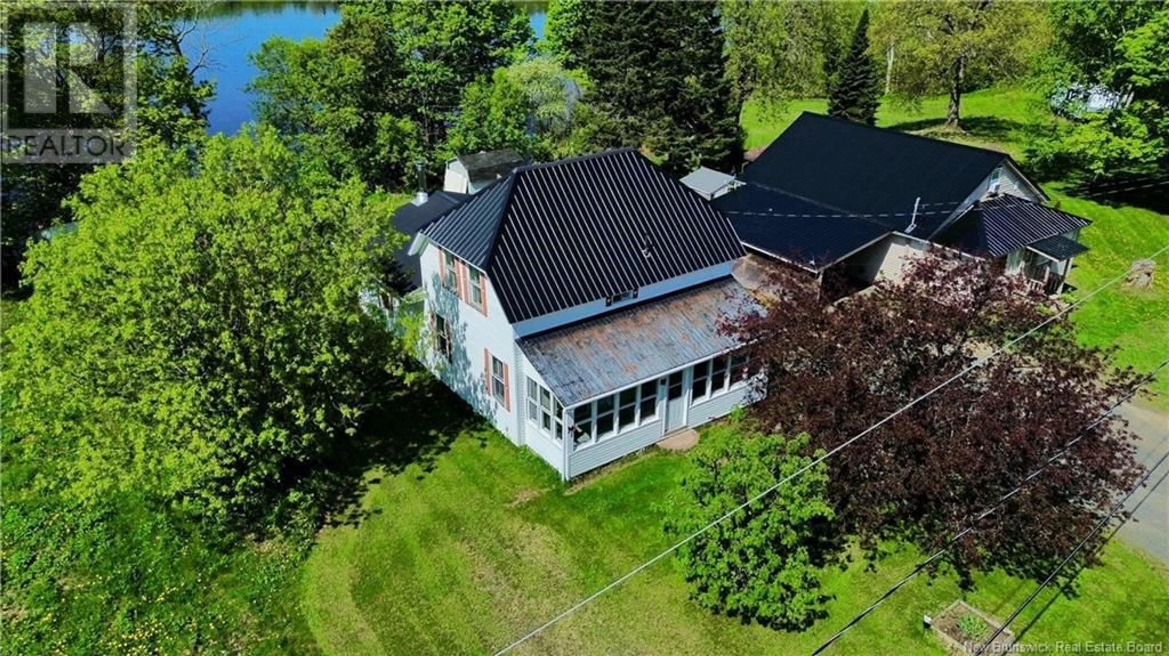 A pic from outside/outdoor area/front of a property/back of a property/a pic from drone, water/lake/river/ocean view for 205 UPPER KENT ROAD, Upper Kent New Brunswick E7J2E3