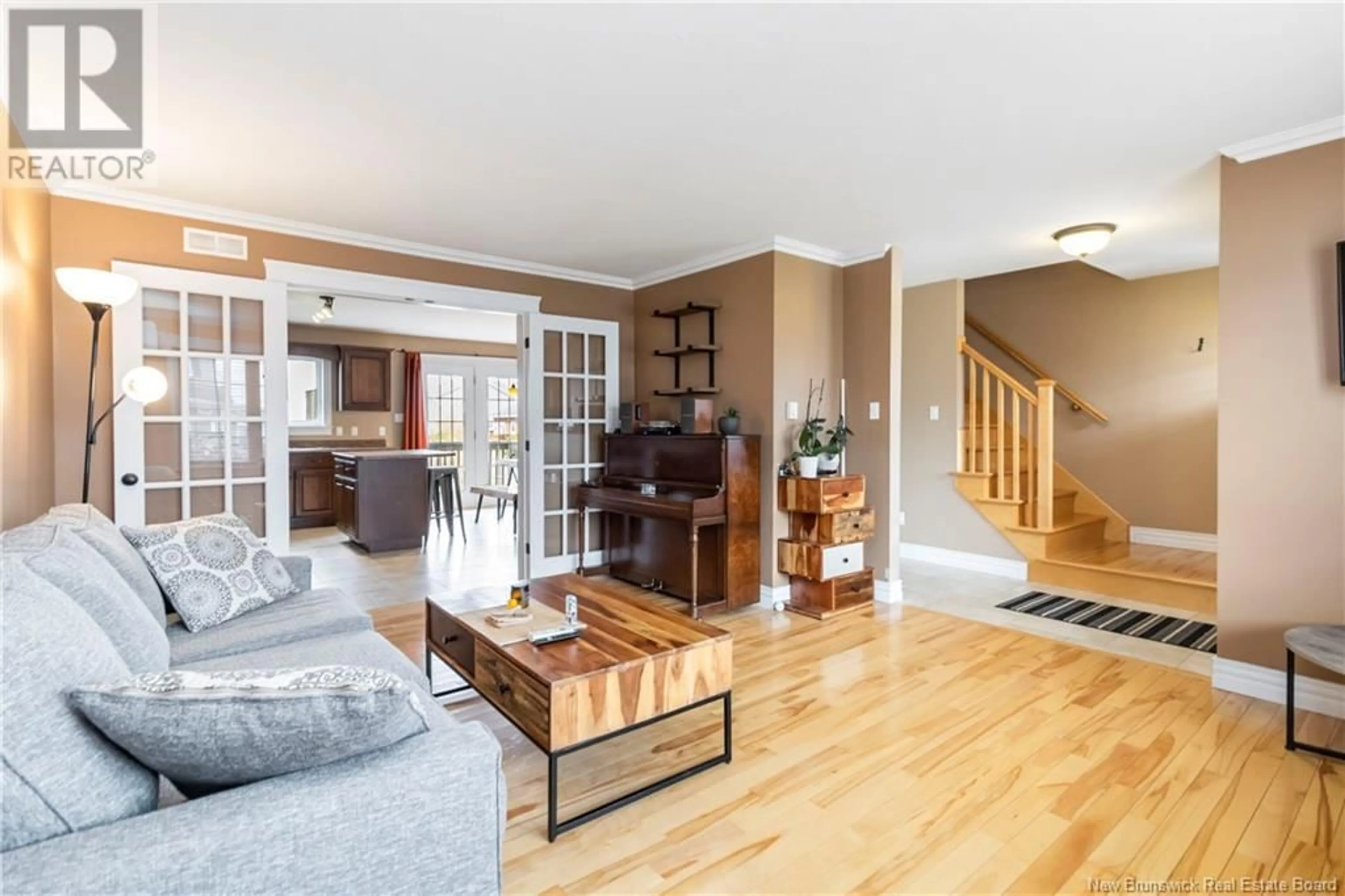 Living room with furniture, wood/laminate floor for 17 COACHMEN STREET, Riverview New Brunswick E1B3T7