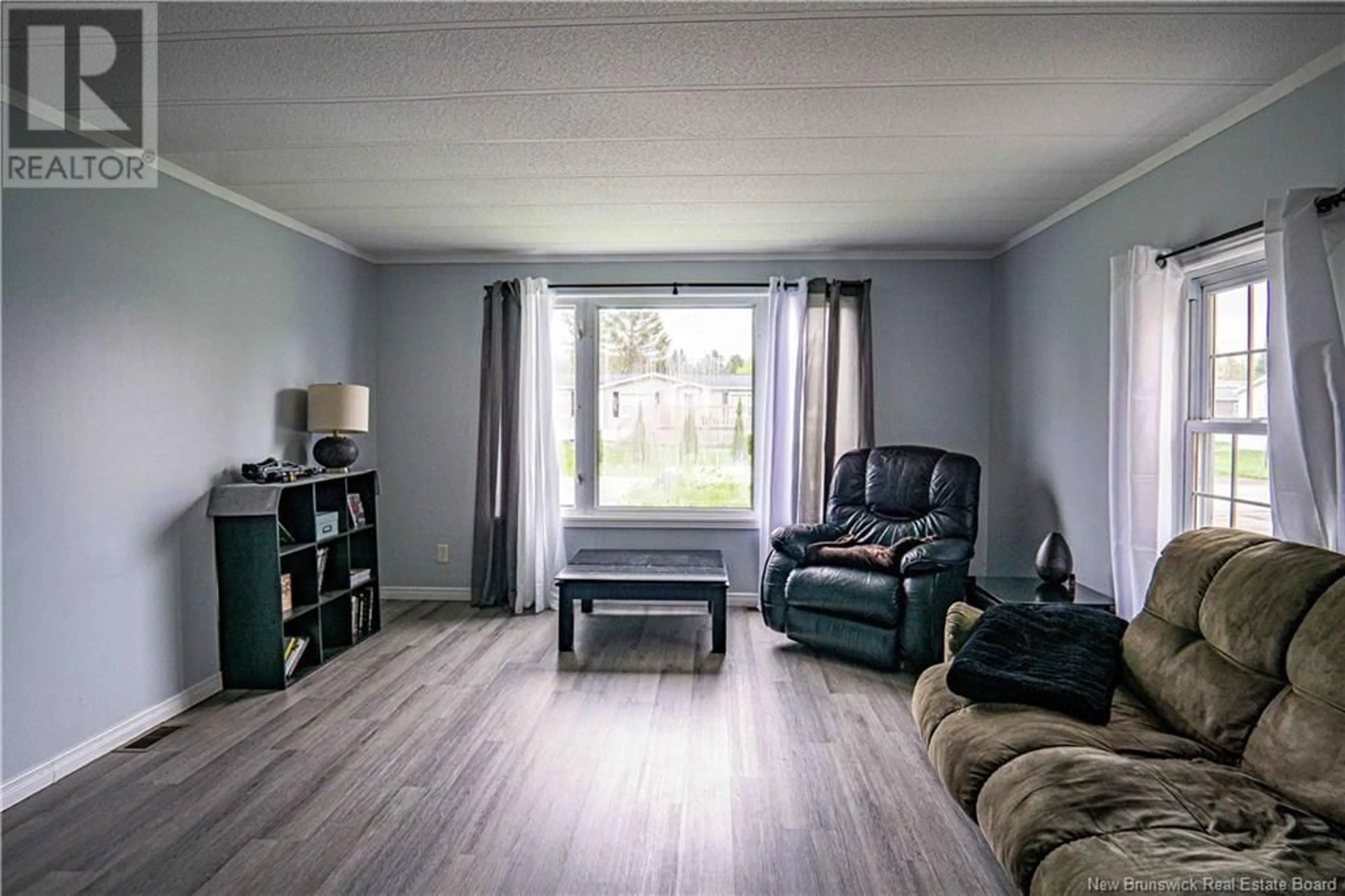 Living room with furniture, wood/laminate floor for 61 TAMARACK DRIVE, Lincoln New Brunswick E3B6W1