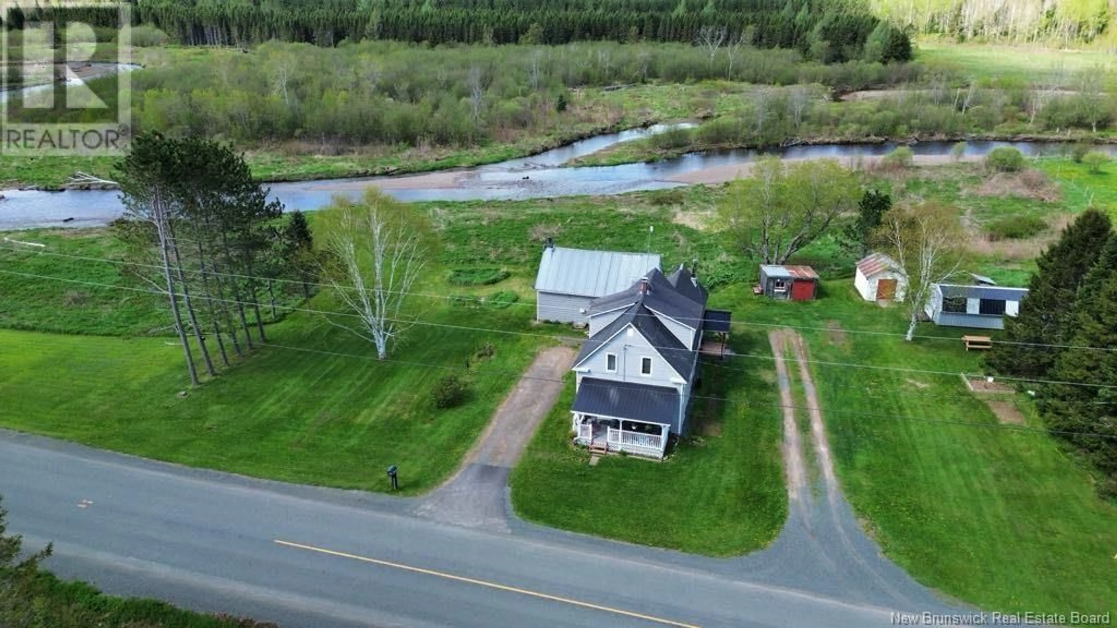 A pic from outside/outdoor area/front of a property/back of a property/a pic from drone, water/lake/river/ocean view for 6369 104 ROUTE, Cloverdale New Brunswick E7P1X5