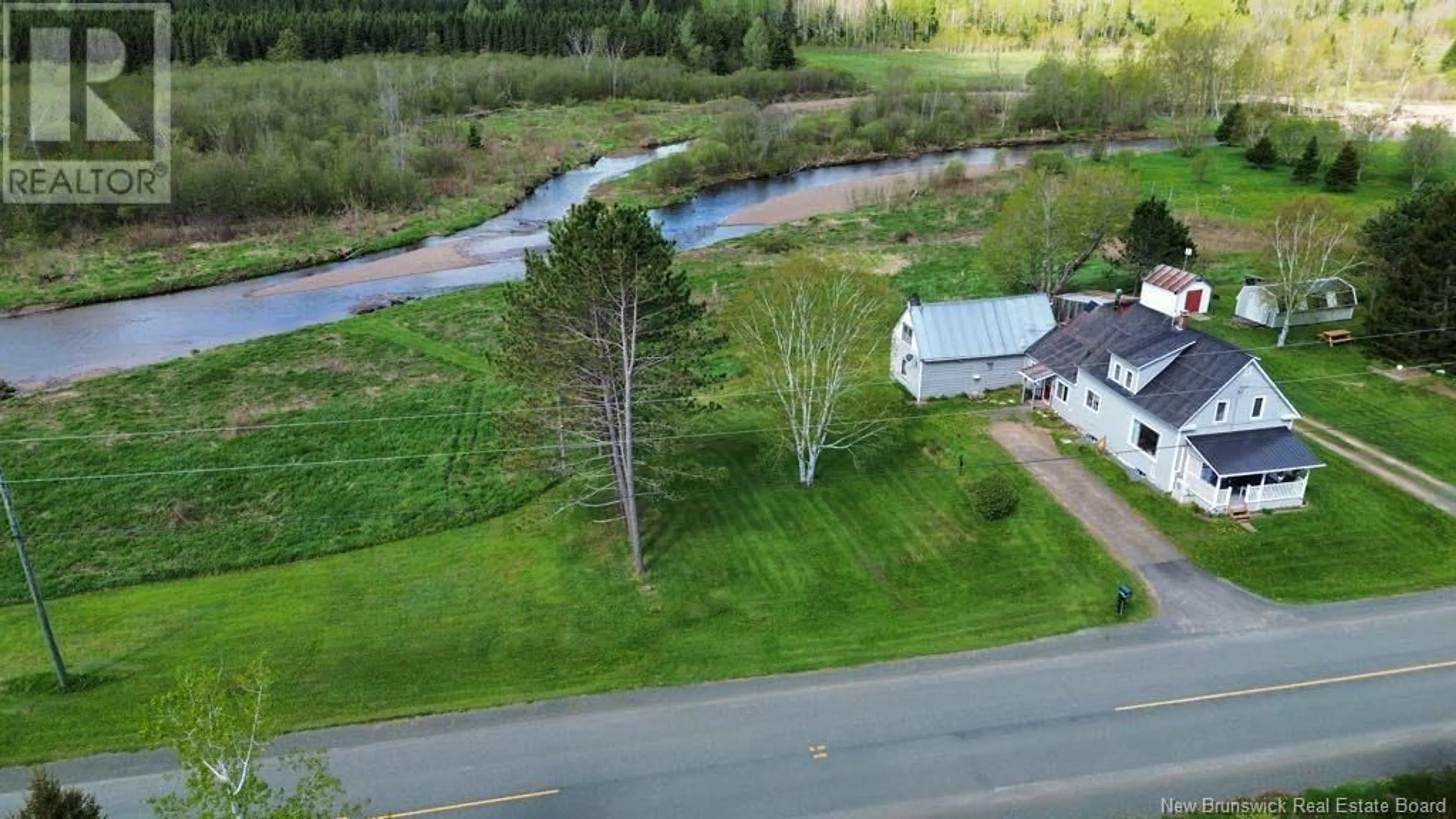 A pic from outside/outdoor area/front of a property/back of a property/a pic from drone, water/lake/river/ocean view for 6369 104 ROUTE, Cloverdale New Brunswick E7P1X5