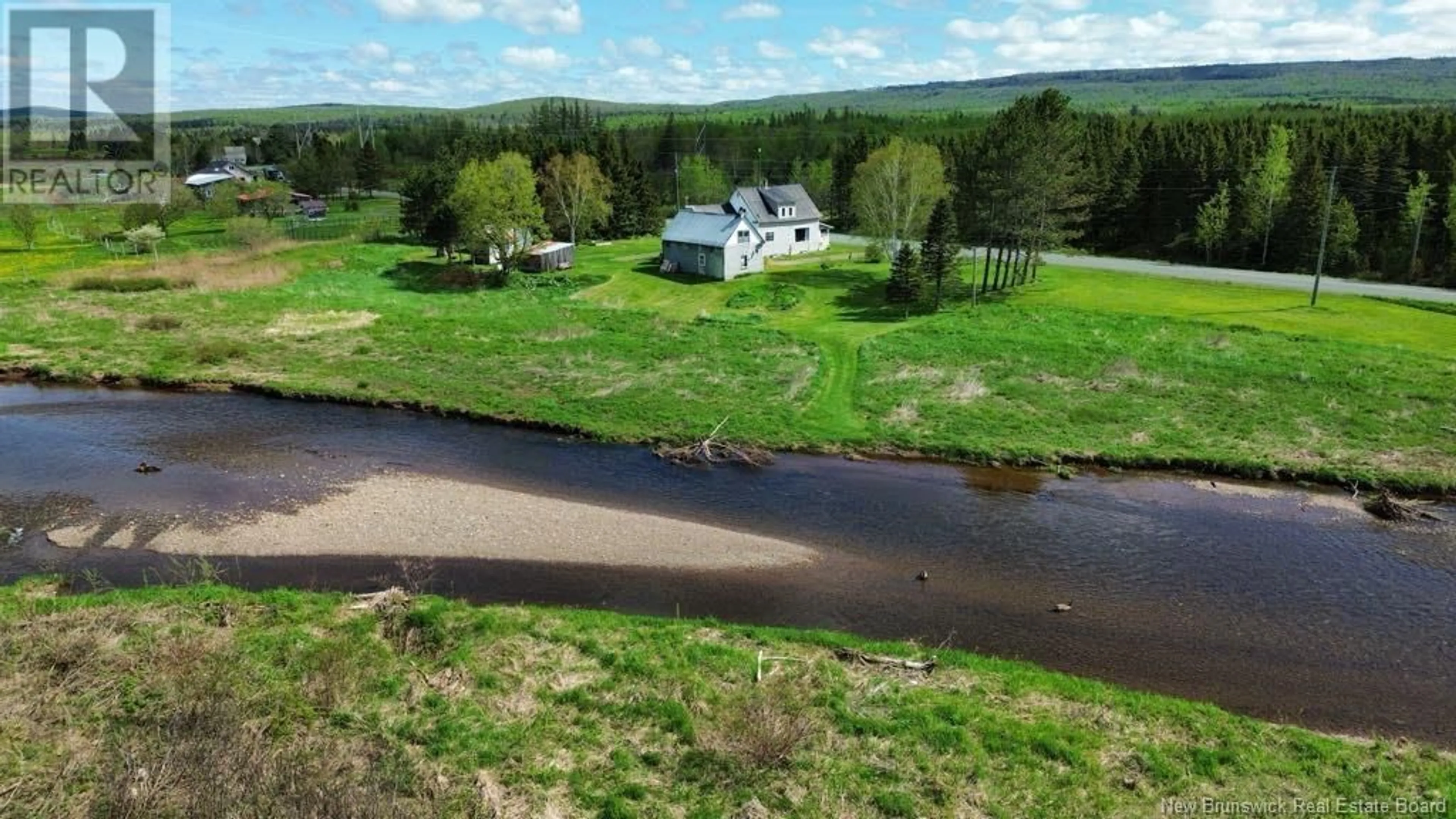 A pic from outside/outdoor area/front of a property/back of a property/a pic from drone, water/lake/river/ocean view for 6369 104 ROUTE, Cloverdale New Brunswick E7P1X5