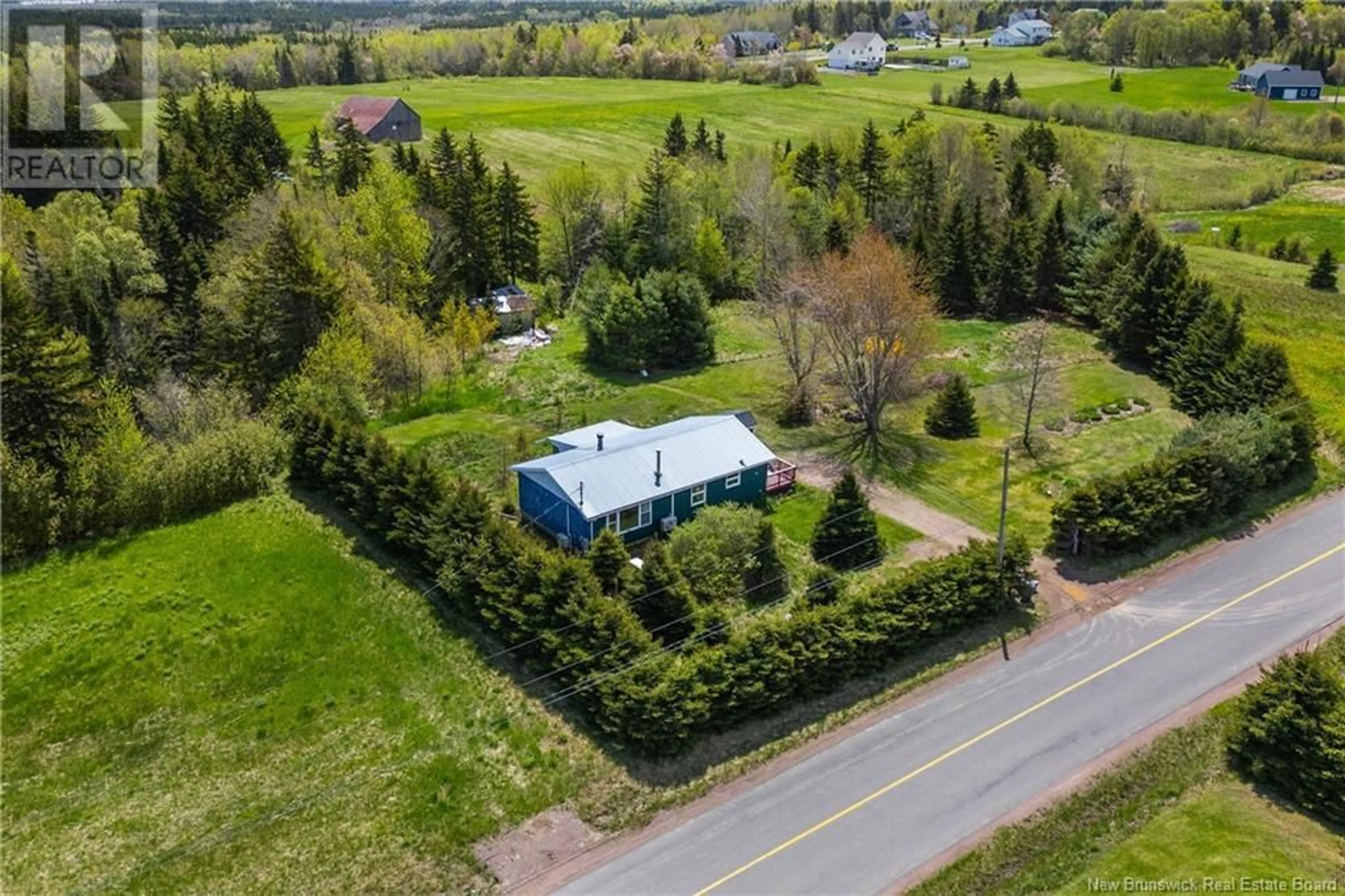 A pic from outside/outdoor area/front of a property/back of a property/a pic from drone, street for 119 STANLEY DRIVE, Sackville New Brunswick E4L1R1