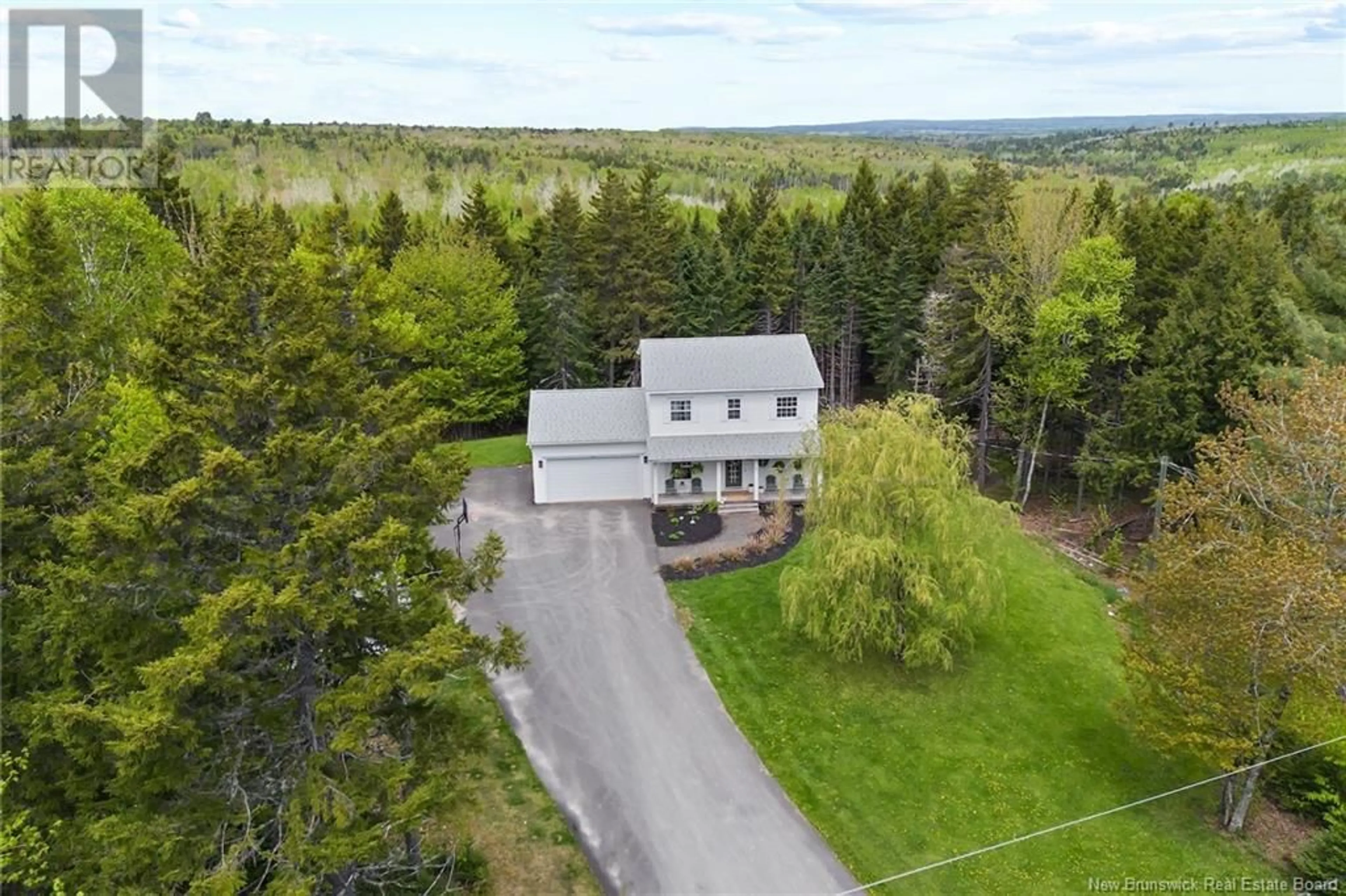 A pic from outside/outdoor area/front of a property/back of a property/a pic from drone, unknown for 8 FIREWOOD LANE, Douglas New Brunswick E3G7X1