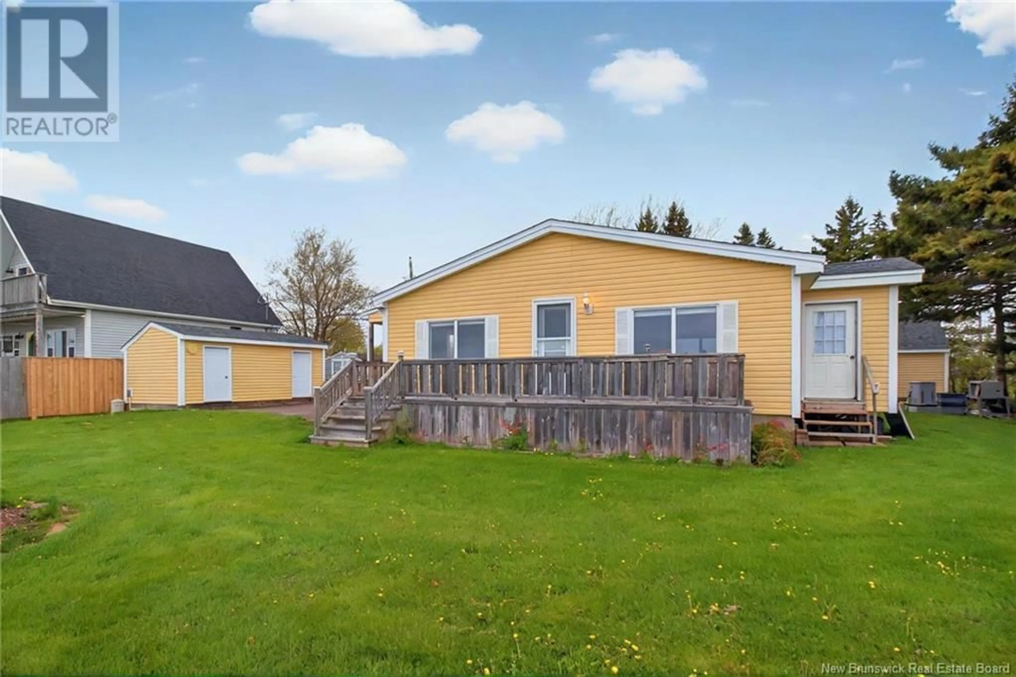 A pic from outside/outdoor area/front of a property/back of a property/a pic from drone, unknown for 14 DE LA MER BOULEVARD, Cocagne New Brunswick E4R2L7