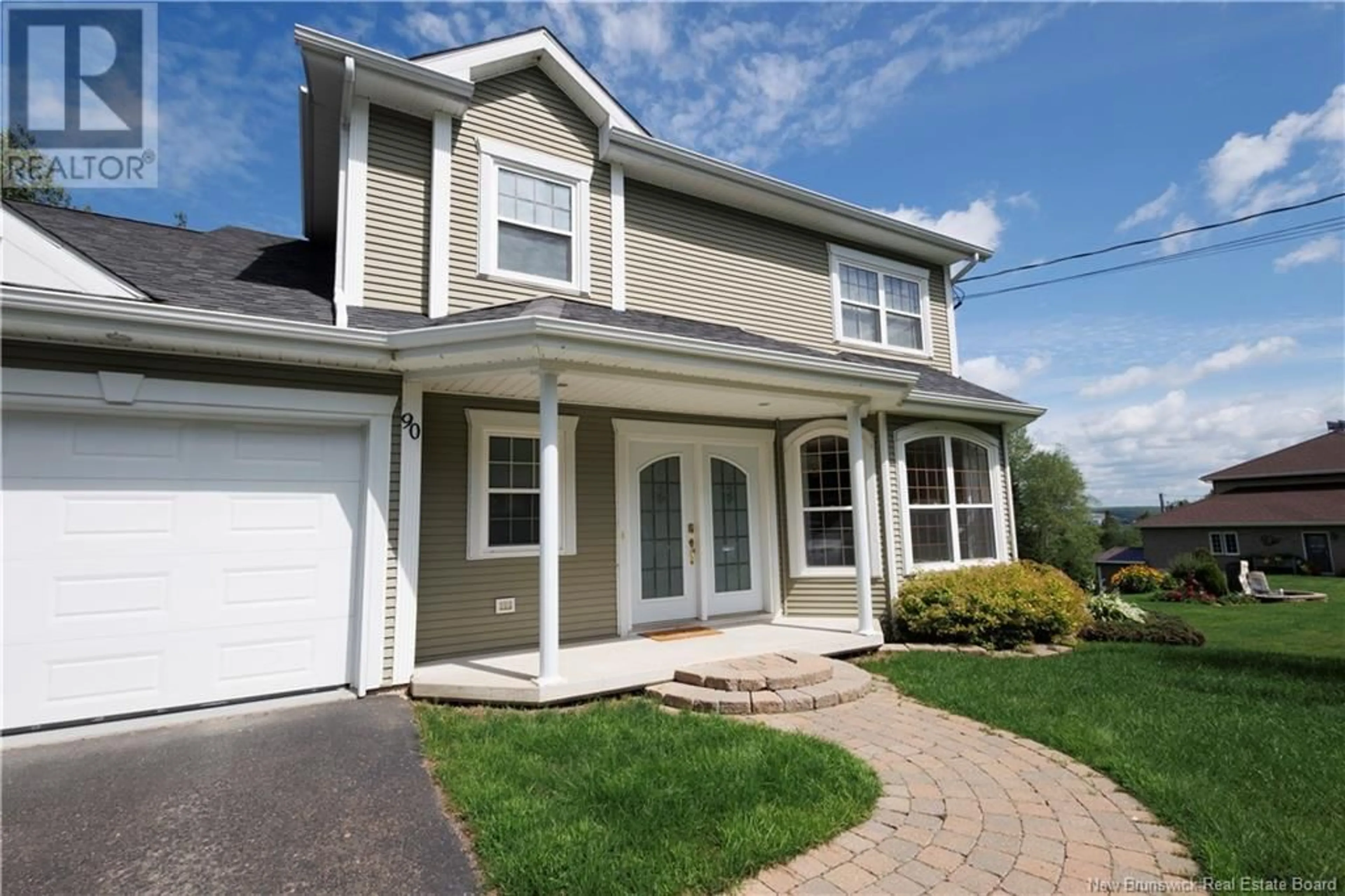 Home with vinyl exterior material, street for 90 NOWLAN STREET, Grand-Sault/Grand Falls New Brunswick E3Z1B2