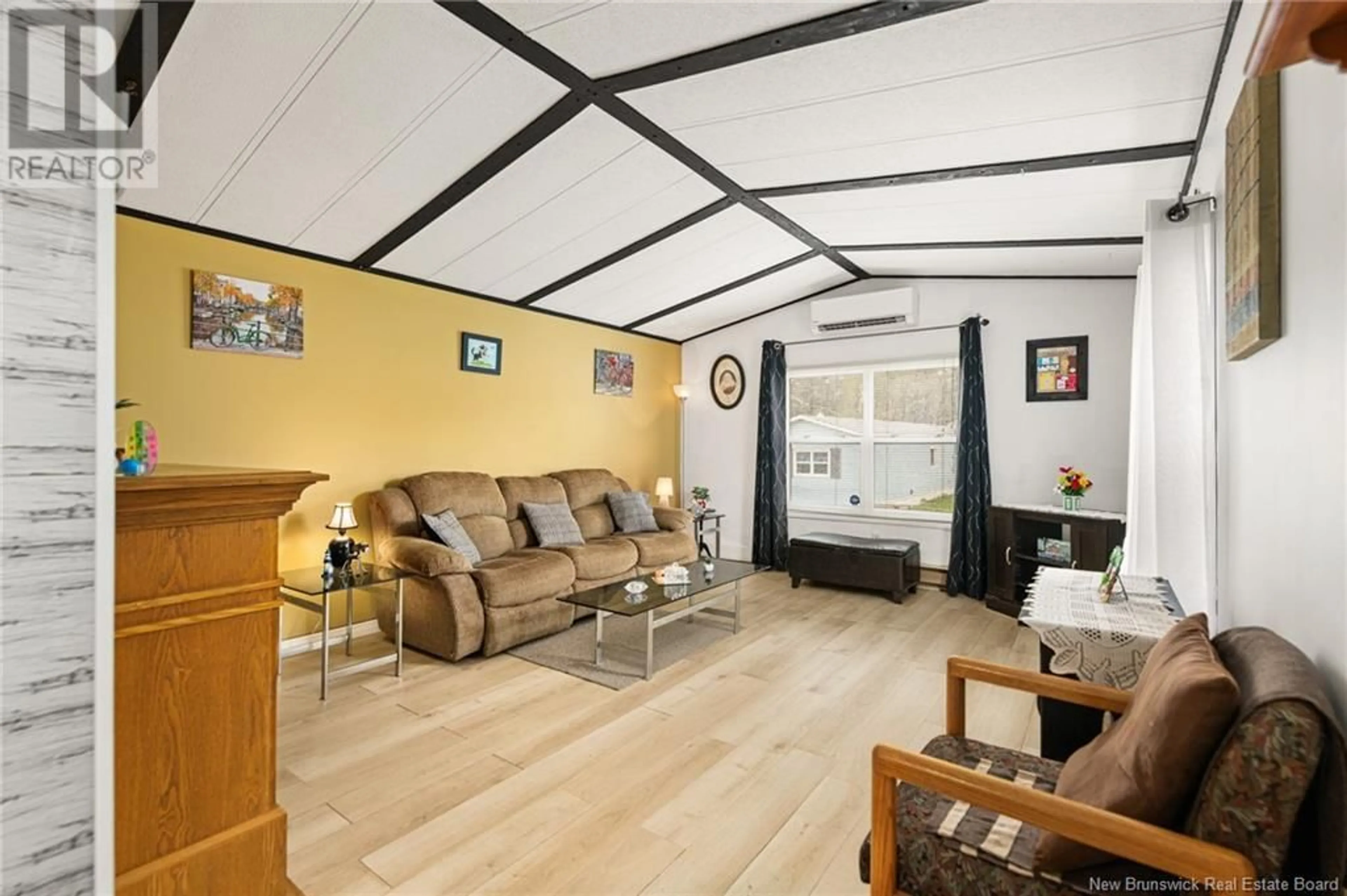 Living room with furniture, wood/laminate floor for 32 MIDWAY, Moncton New Brunswick E1E2J5