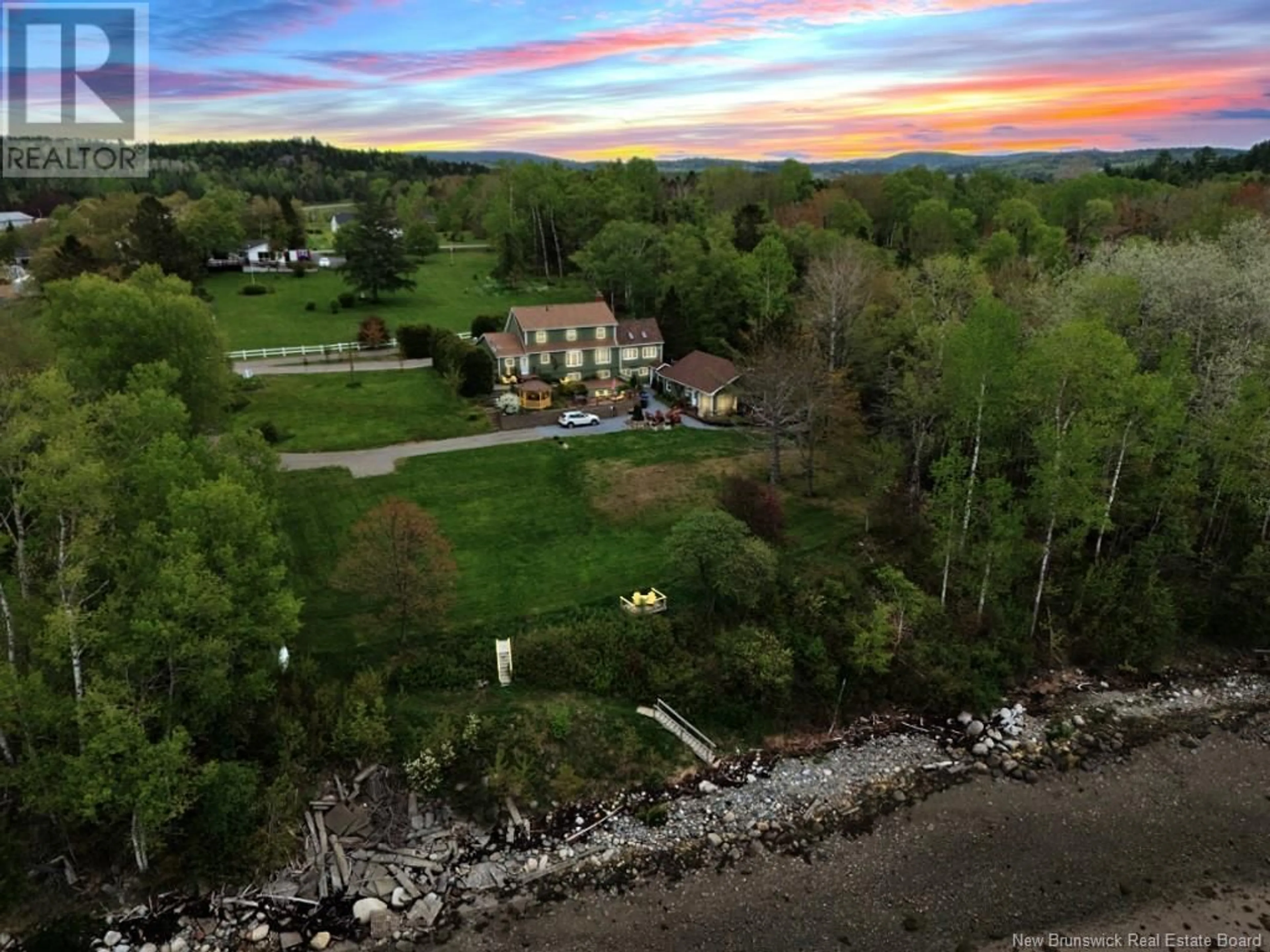 A pic from outside/outdoor area/front of a property/back of a property/a pic from drone, mountain view for 14 MURRAY LANE, Oak Bay New Brunswick E3L4H9