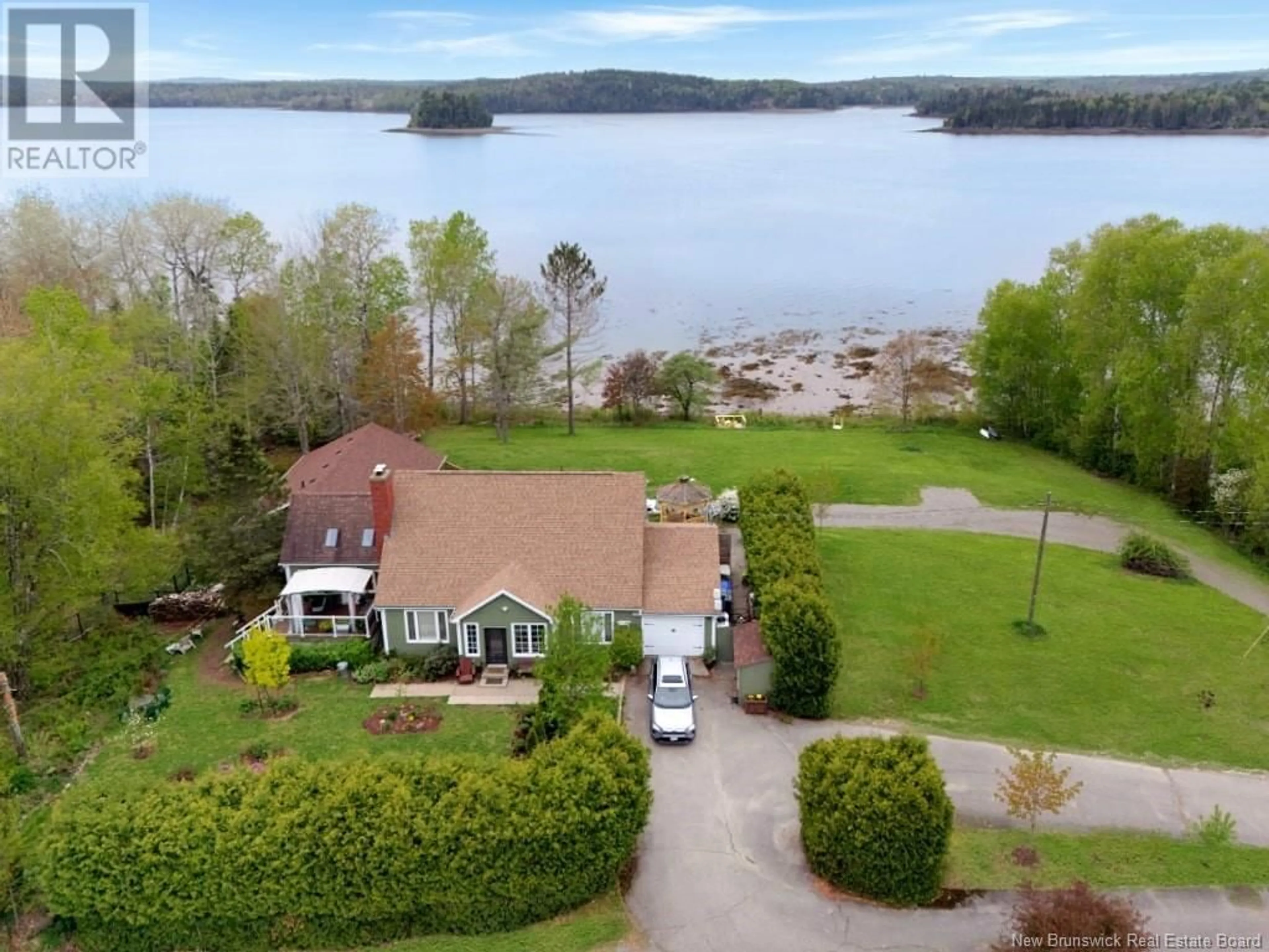 A pic from outside/outdoor area/front of a property/back of a property/a pic from drone, water/lake/river/ocean view for 14 MURRAY LANE, Oak Bay New Brunswick E3L4H9