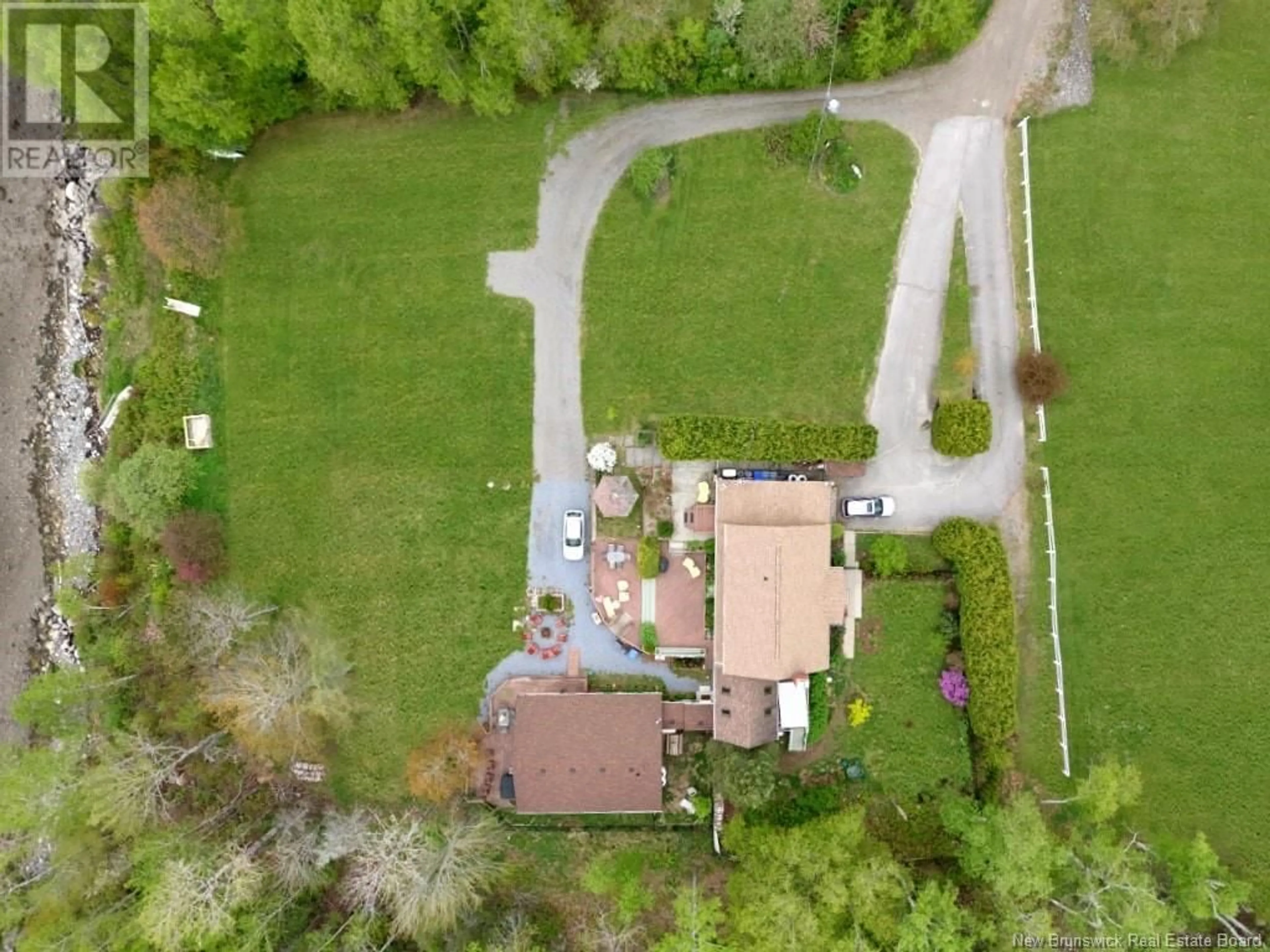 A pic from outside/outdoor area/front of a property/back of a property/a pic from drone, street for 14 MURRAY LANE, Oak Bay New Brunswick E3L4H9