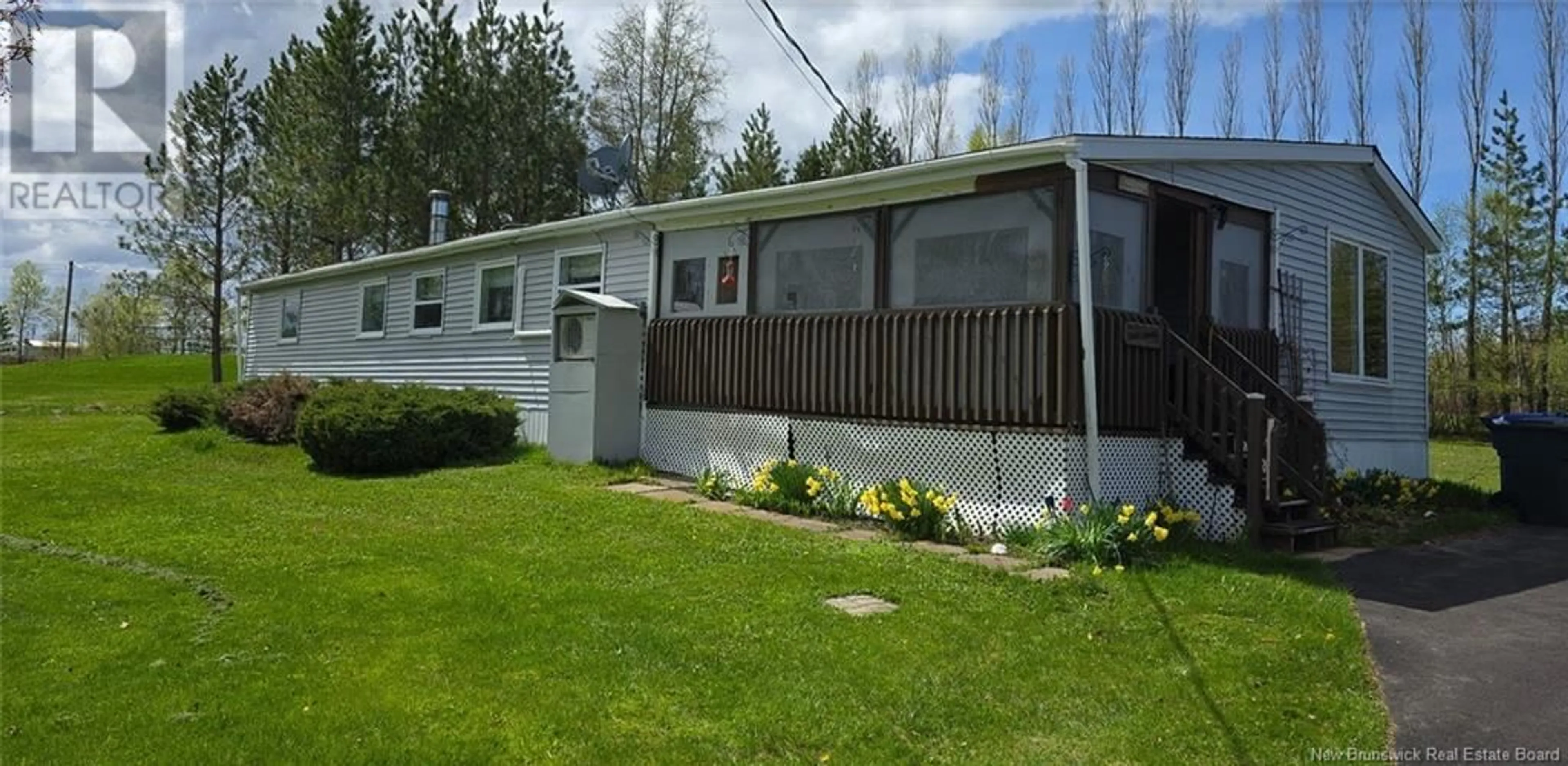 Home with vinyl exterior material, street for 1603 ROUTE 340, Canobie New Brunswick E2A5G7