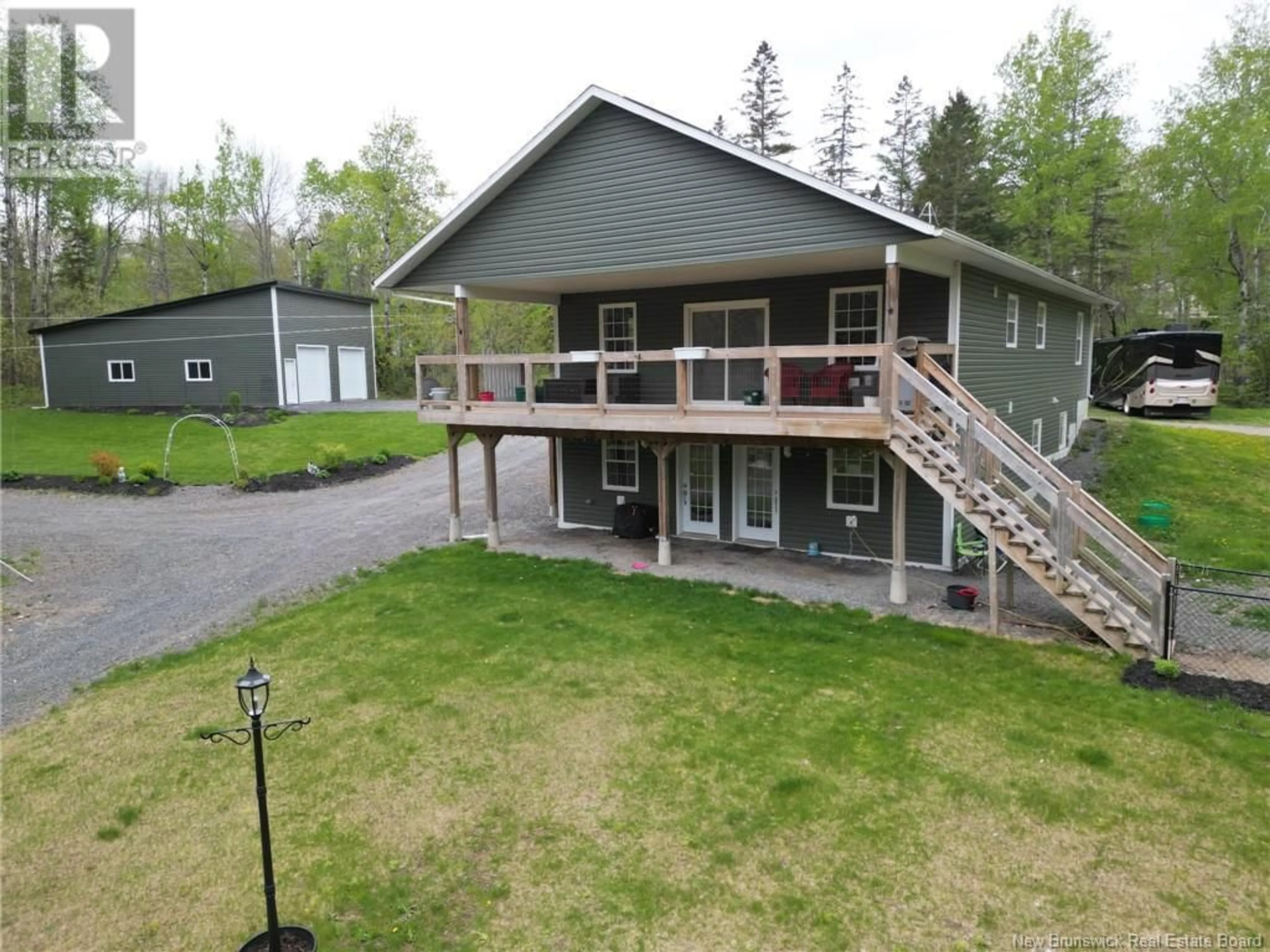 A pic from outside/outdoor area/front of a property/back of a property/a pic from drone, unknown for 18 DRIFTWOOD DRIVE, Hanwell New Brunswick E3E2R8