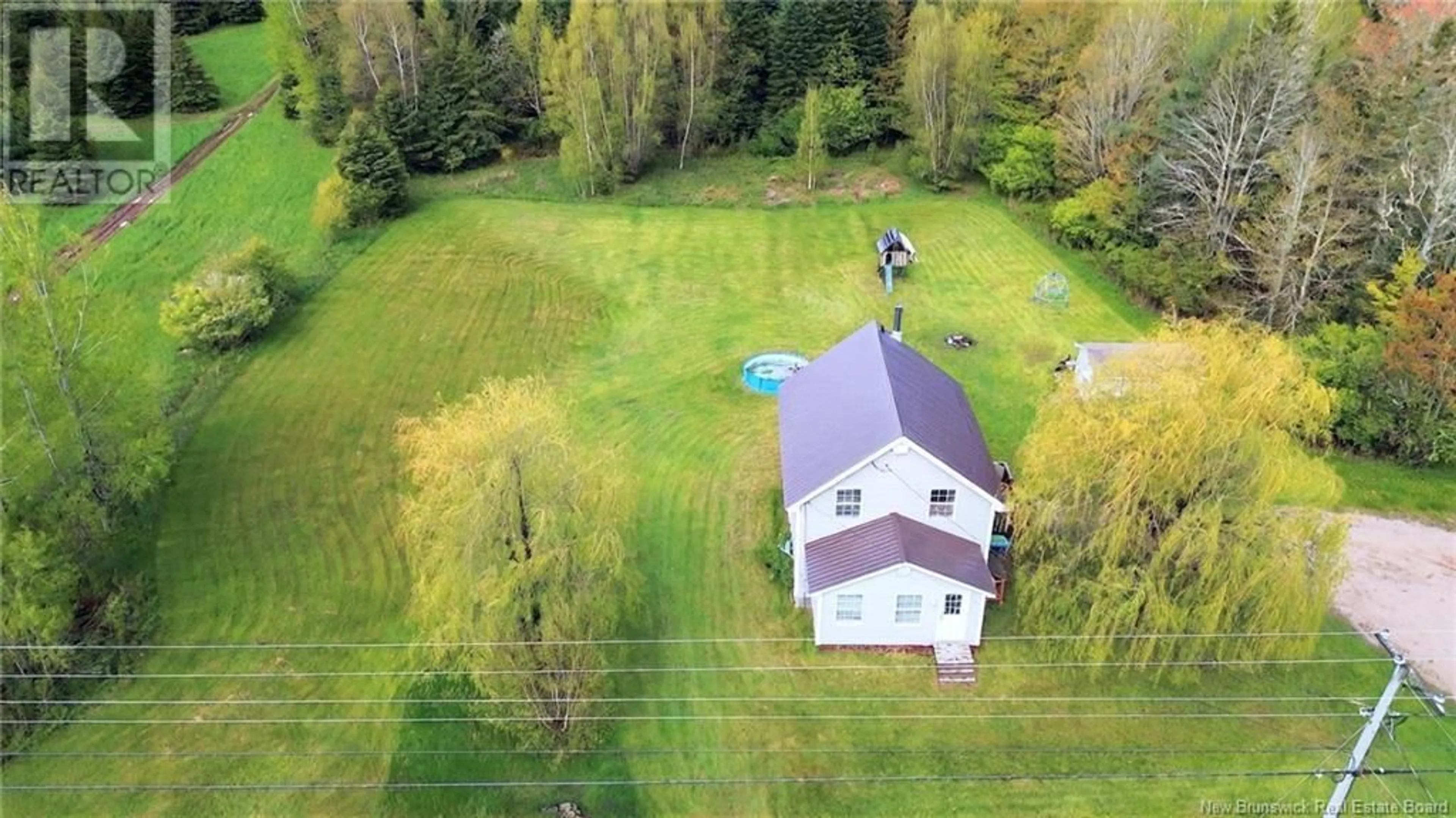 A pic from outside/outdoor area/front of a property/back of a property/a pic from drone, building for 667 SANATORIUM ROAD, The Glades New Brunswick E4J1W5