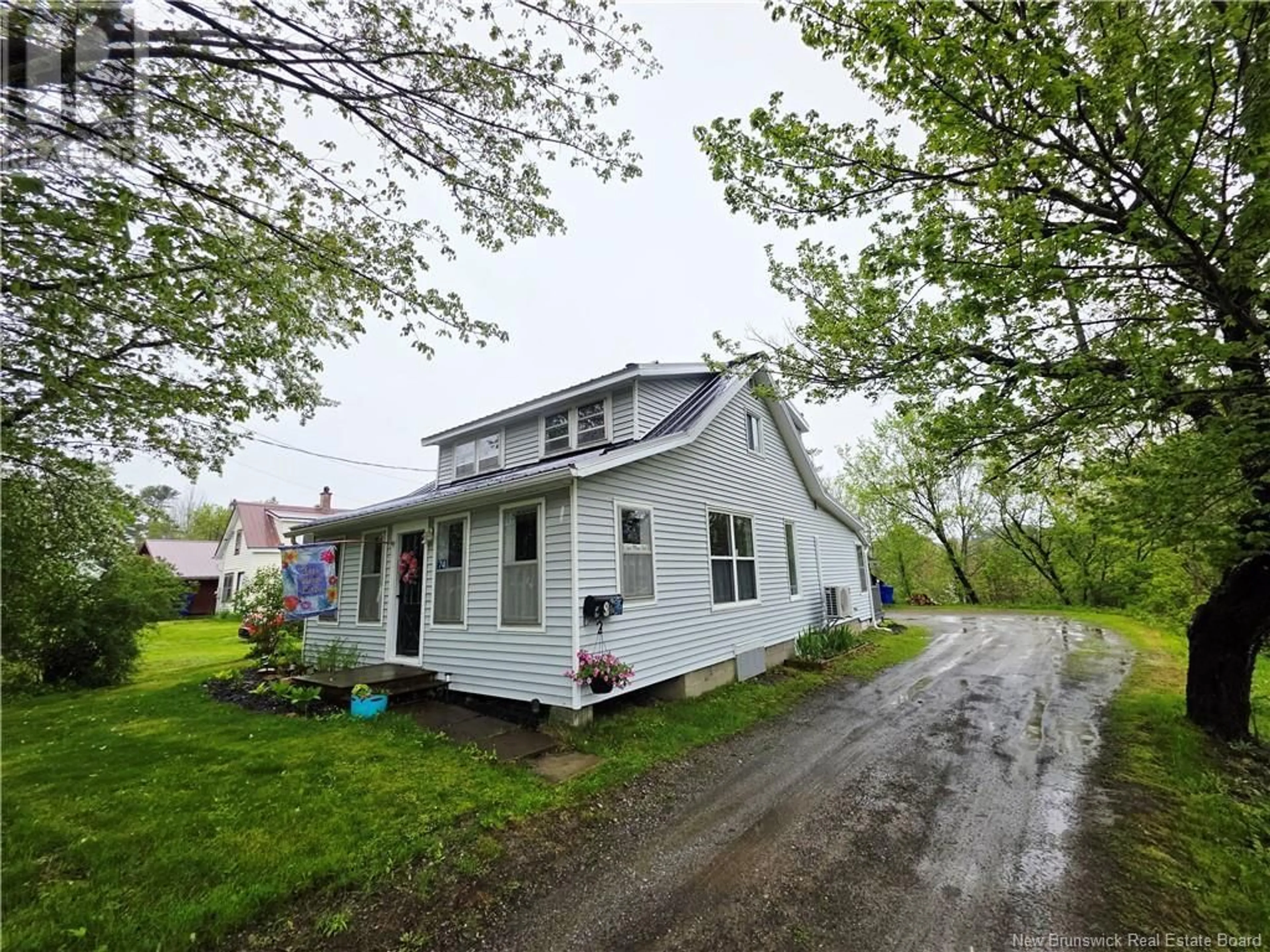 A pic from outside/outdoor area/front of a property/back of a property/a pic from drone, street for 74 WEST STREET, St. Stephen New Brunswick E3L1P6