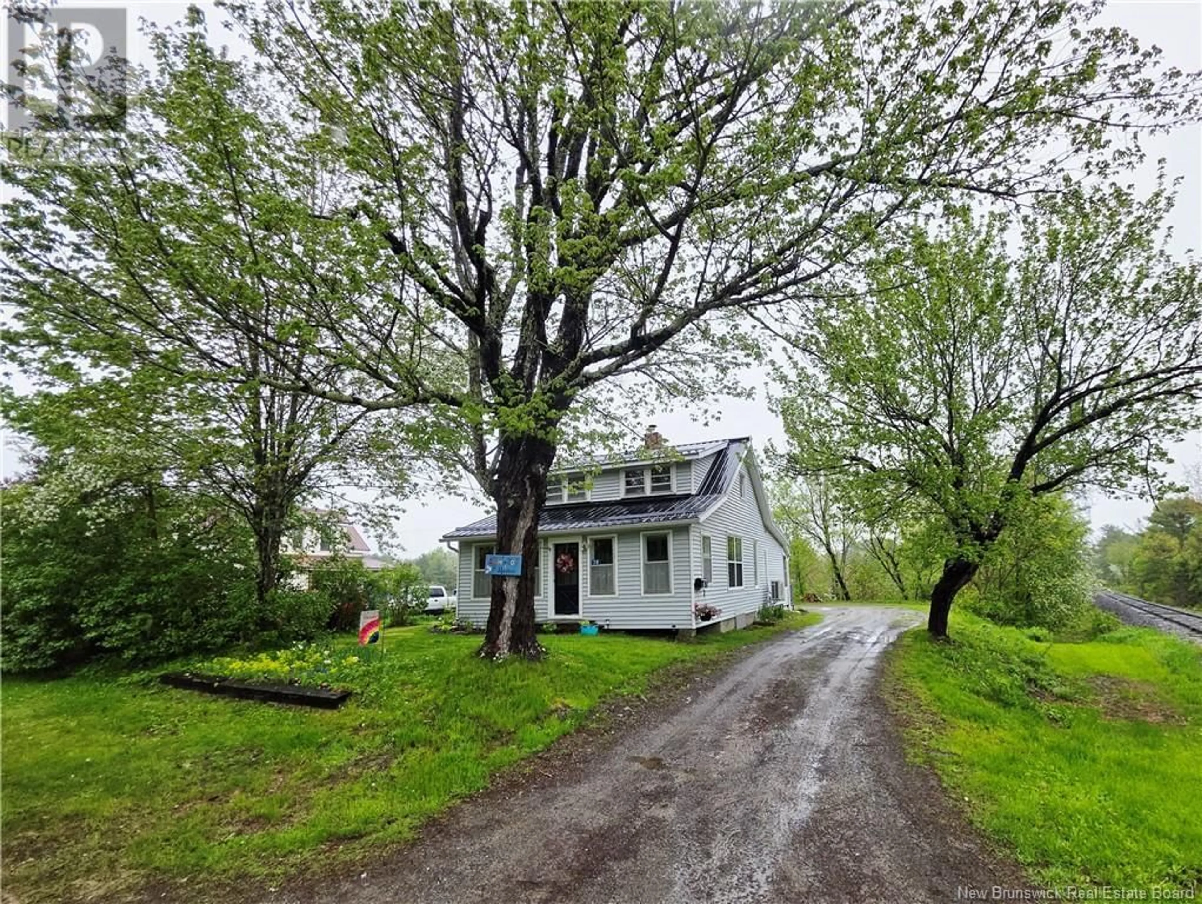 A pic from outside/outdoor area/front of a property/back of a property/a pic from drone, street for 74 WEST STREET, St. Stephen New Brunswick E3L1P6