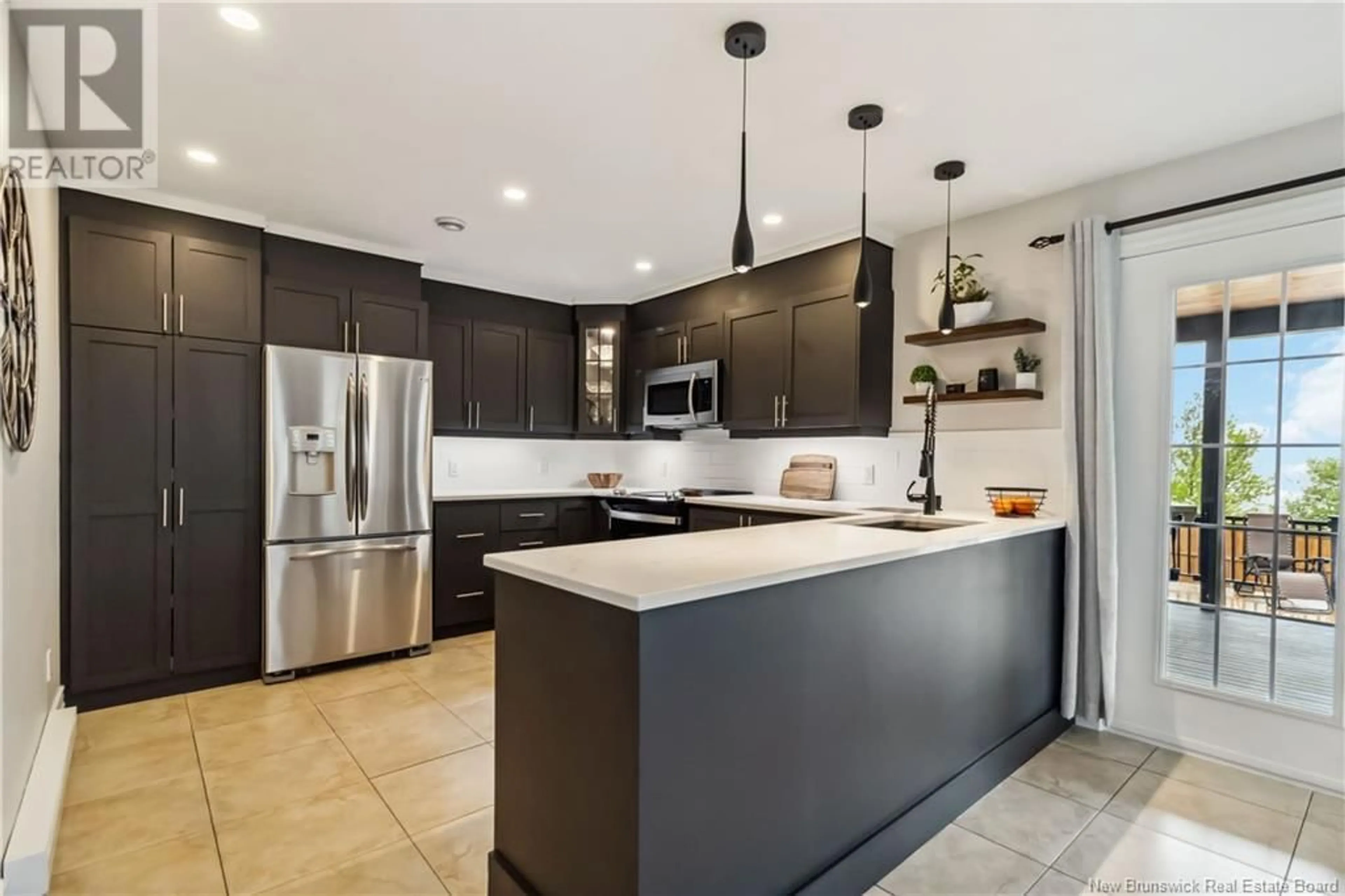 Contemporary kitchen, ceramic/tile floor for 110 RUE JEAN-CHARLES, Dieppe New Brunswick E1A0C3
