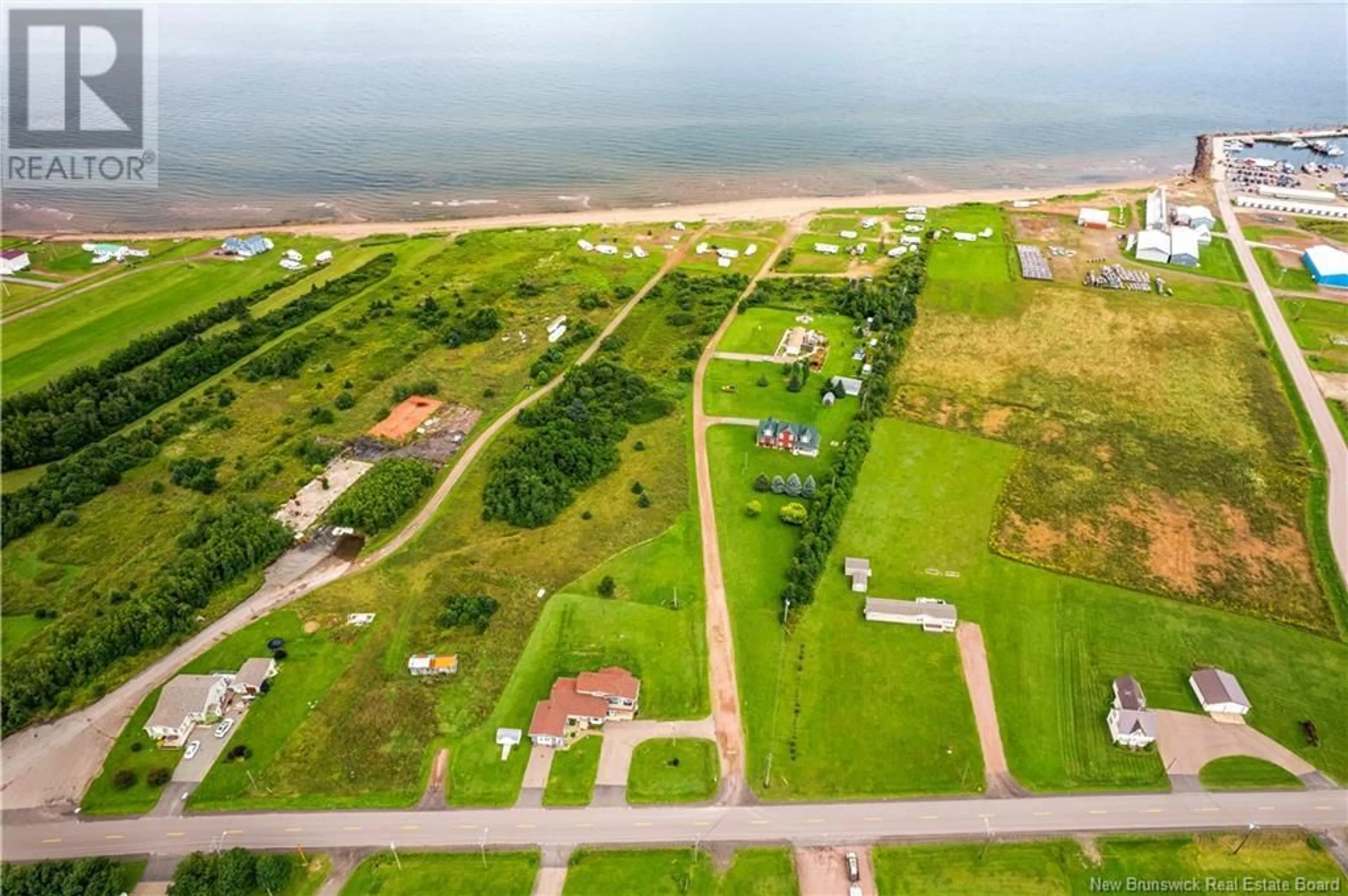 A pic from outside/outdoor area/front of a property/back of a property/a pic from drone, water/lake/river/ocean view for 1988 ROUTE 950, Petit-Cap New Brunswick E4N2J4