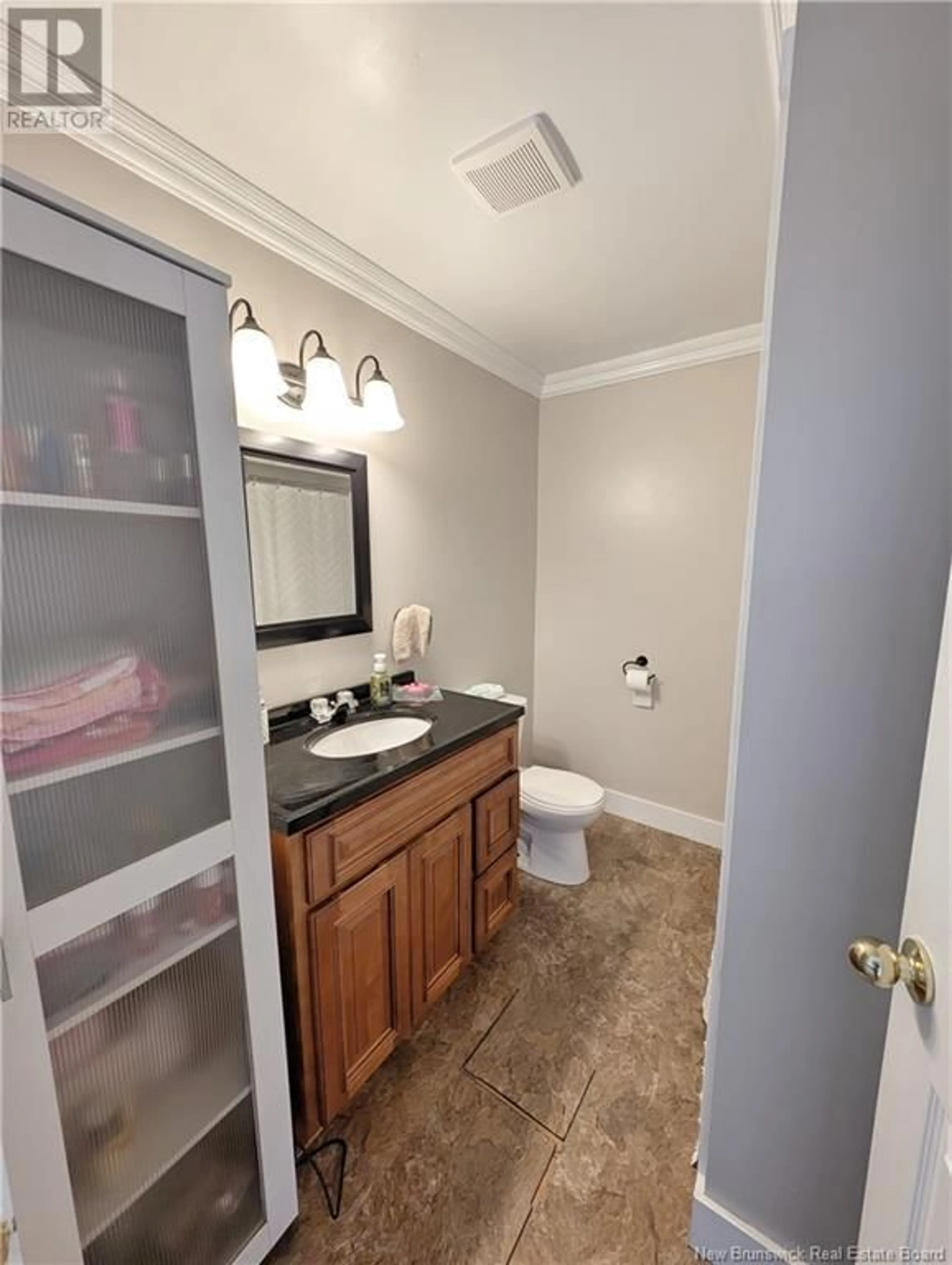 Standard bathroom, ceramic/tile floor for 22 DE LA SOURCE STREET, Le Goulet New Brunswick E8S1Z3