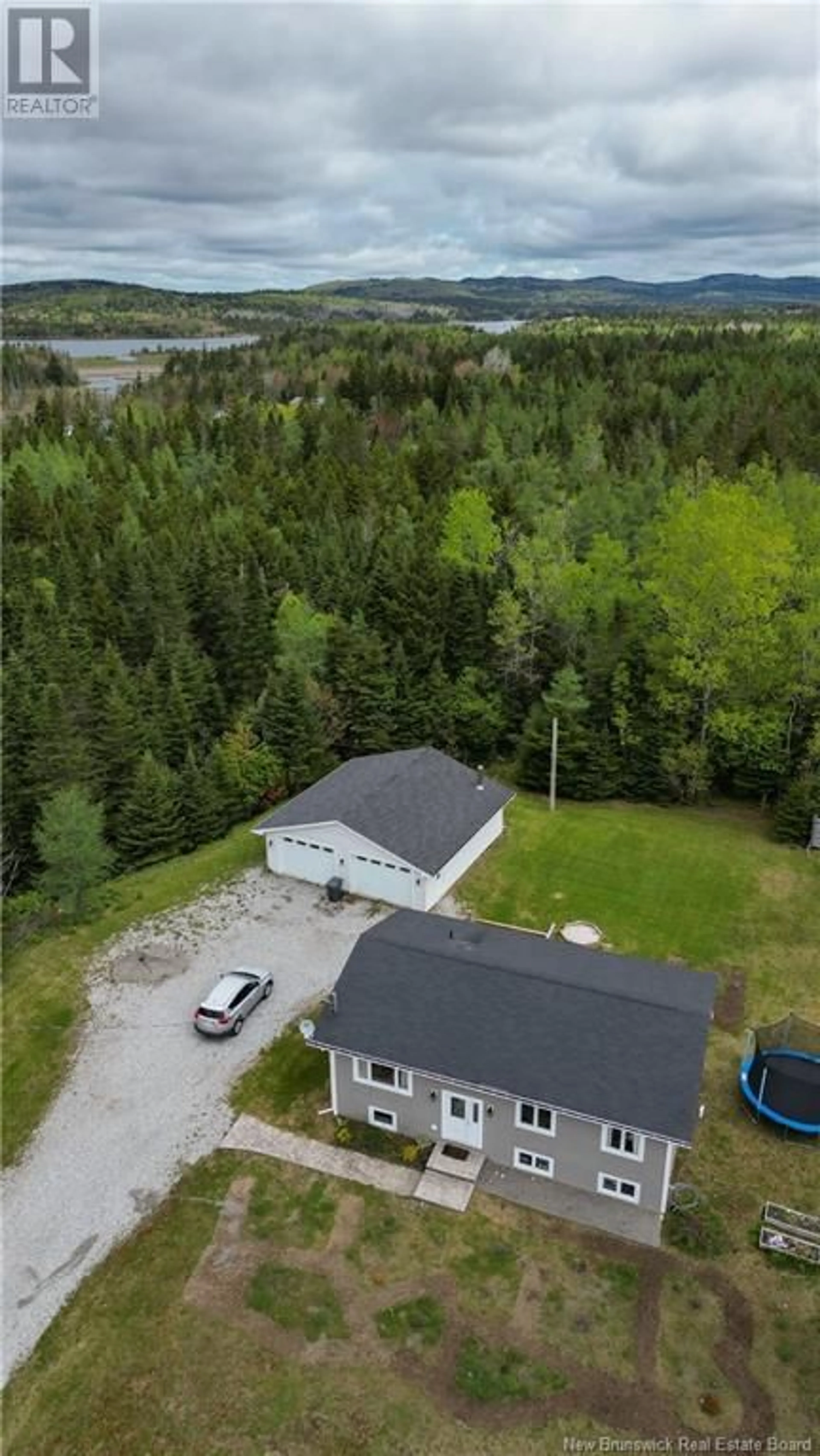 A pic from outside/outdoor area/front of a property/back of a property/a pic from drone, water/lake/river/ocean view for 11 LACKIE LANE, Baxters Corner New Brunswick E2S2N3