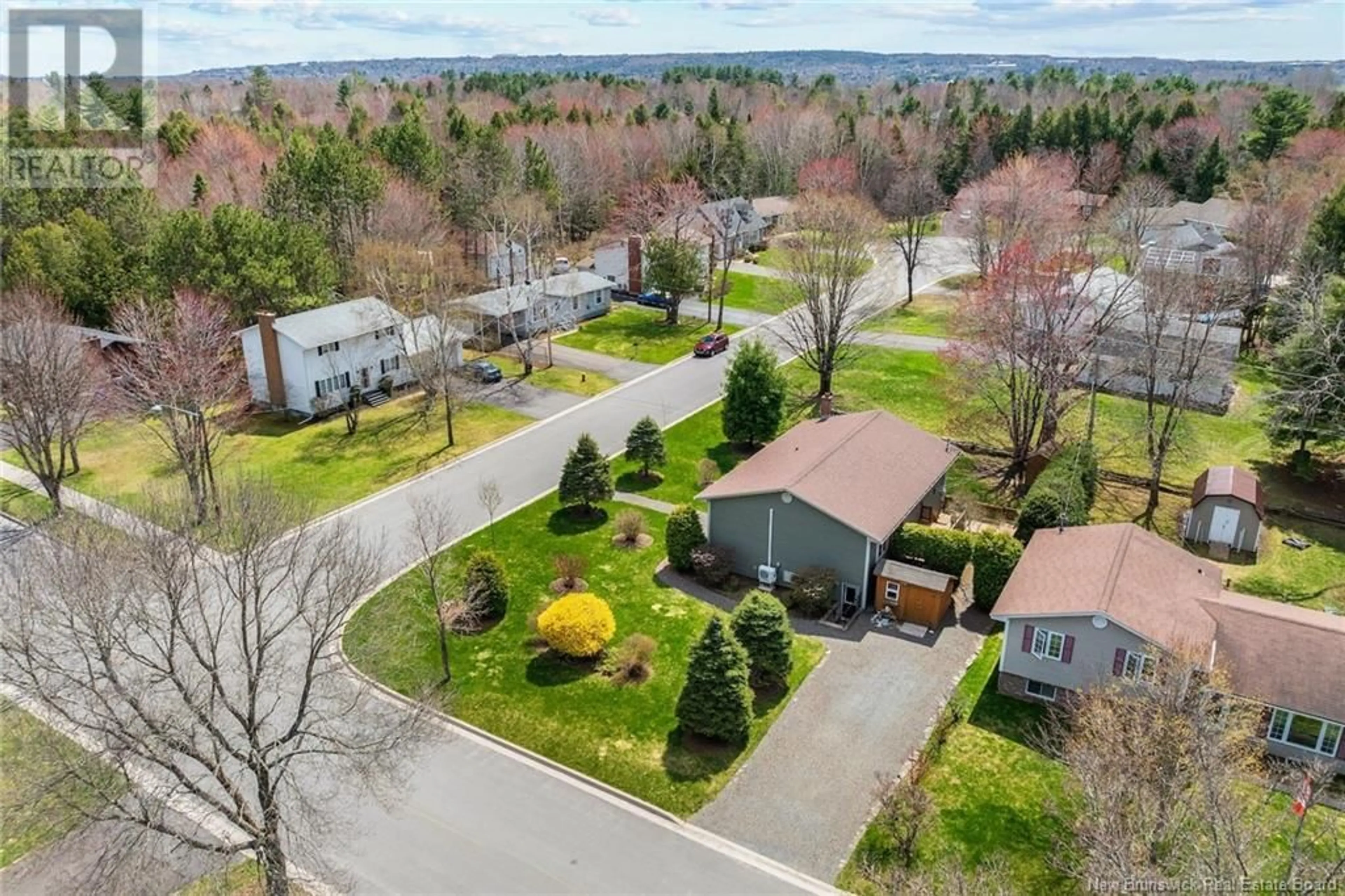 A pic from outside/outdoor area/front of a property/back of a property/a pic from drone, street for 5 SHIBU COURT, Fredericton New Brunswick E3A4T6