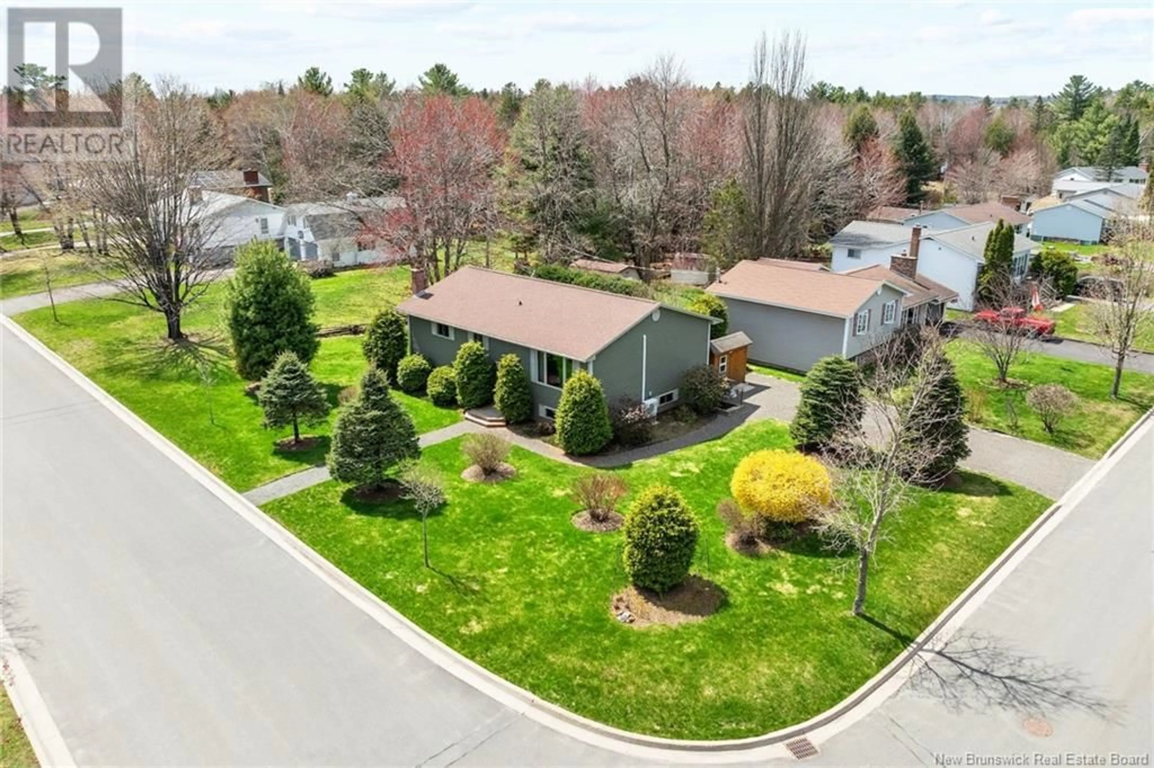 A pic from outside/outdoor area/front of a property/back of a property/a pic from drone, street for 5 SHIBU COURT, Fredericton New Brunswick E3A4T6