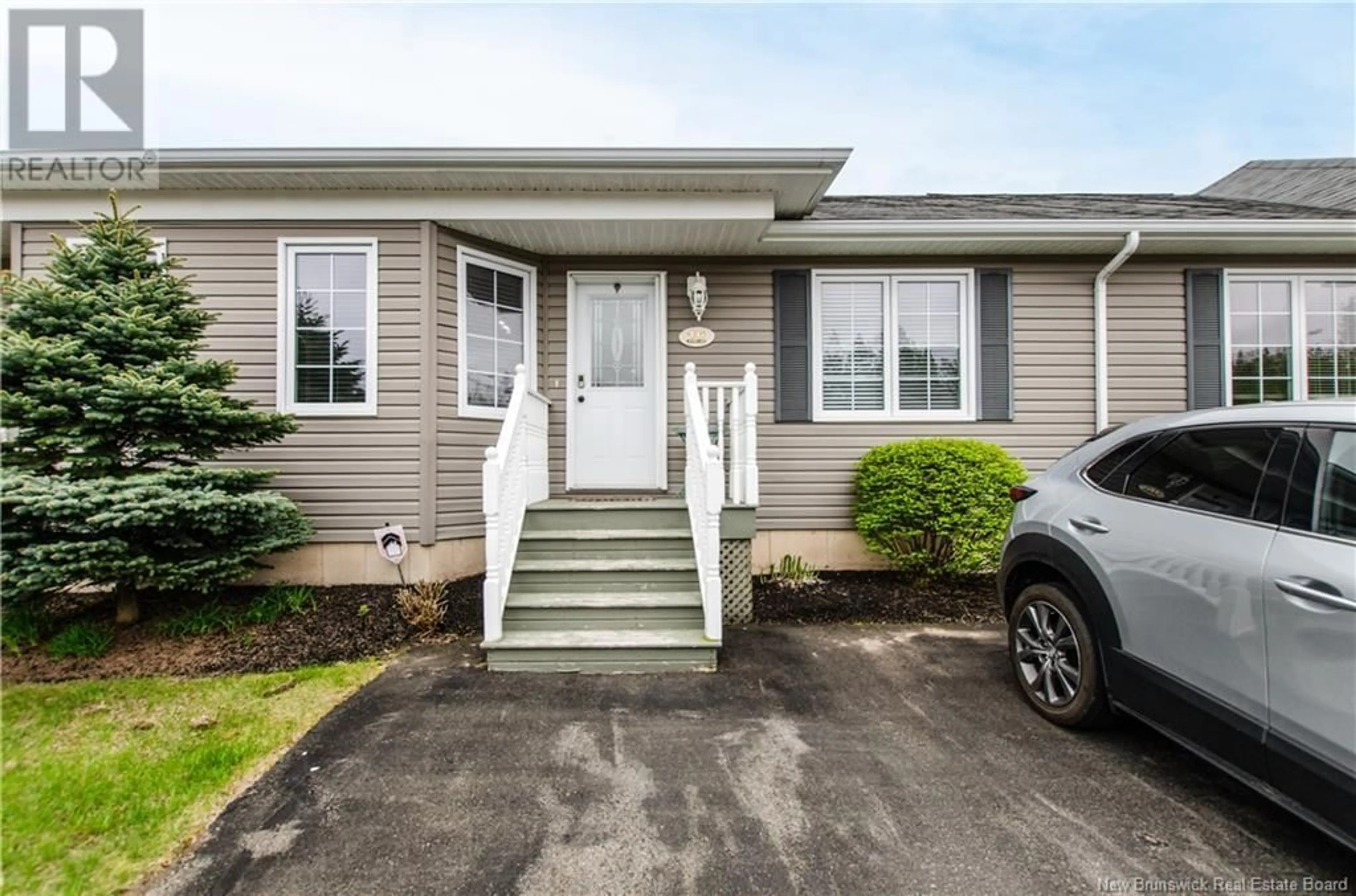Home with vinyl exterior material, street for 16 JAYDEN LANE, Moncton New Brunswick E1G0S2