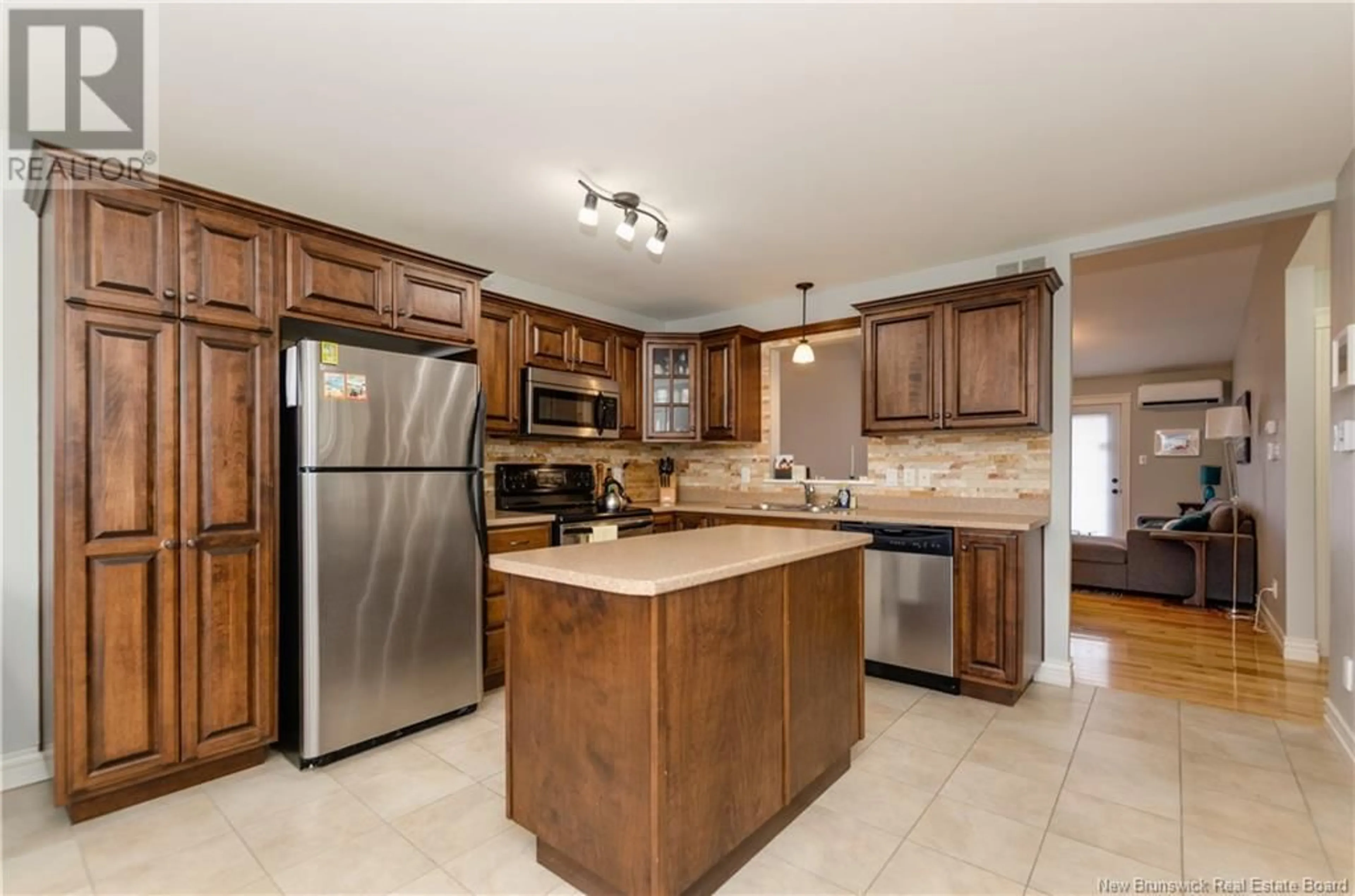 Open concept kitchen, ceramic/tile floor for 16 JAYDEN LANE, Moncton New Brunswick E1G0S2