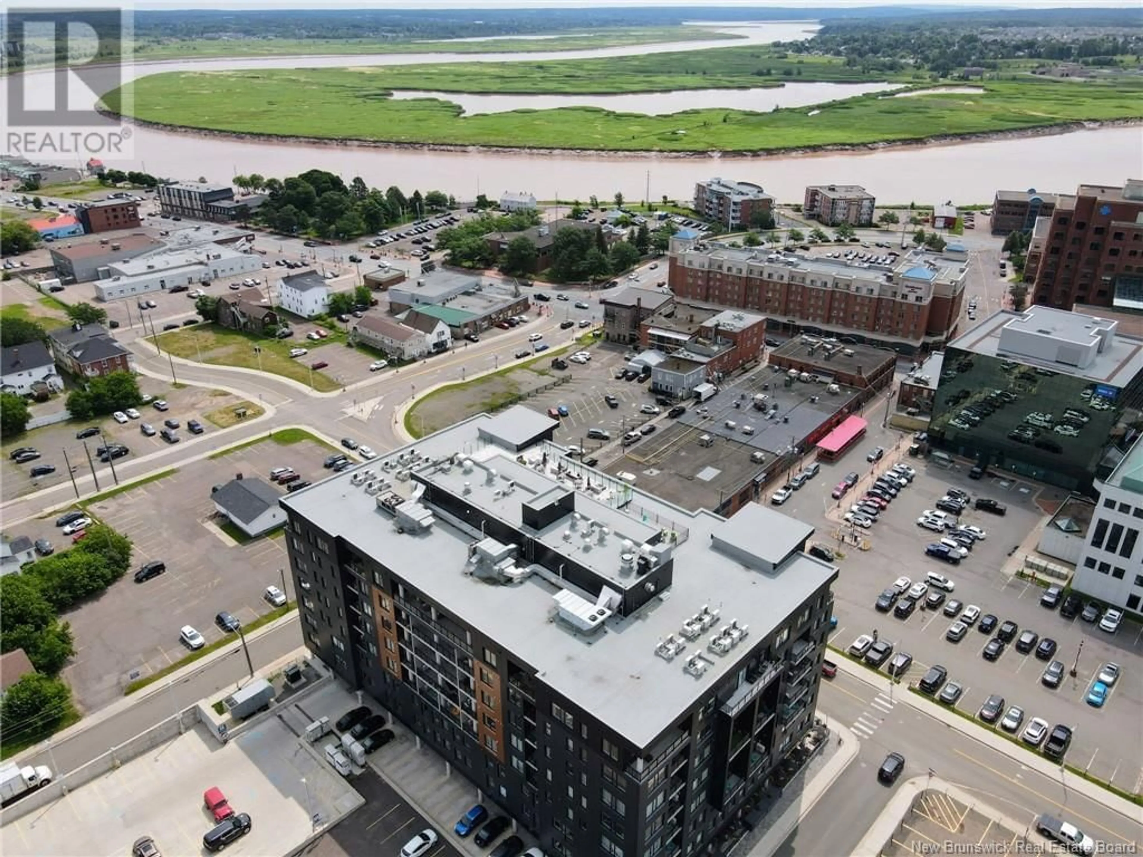 A pic from outside/outdoor area/front of a property/back of a property/a pic from drone, unknown for 609 - 55 QUEEN, Moncton New Brunswick E1C1K2