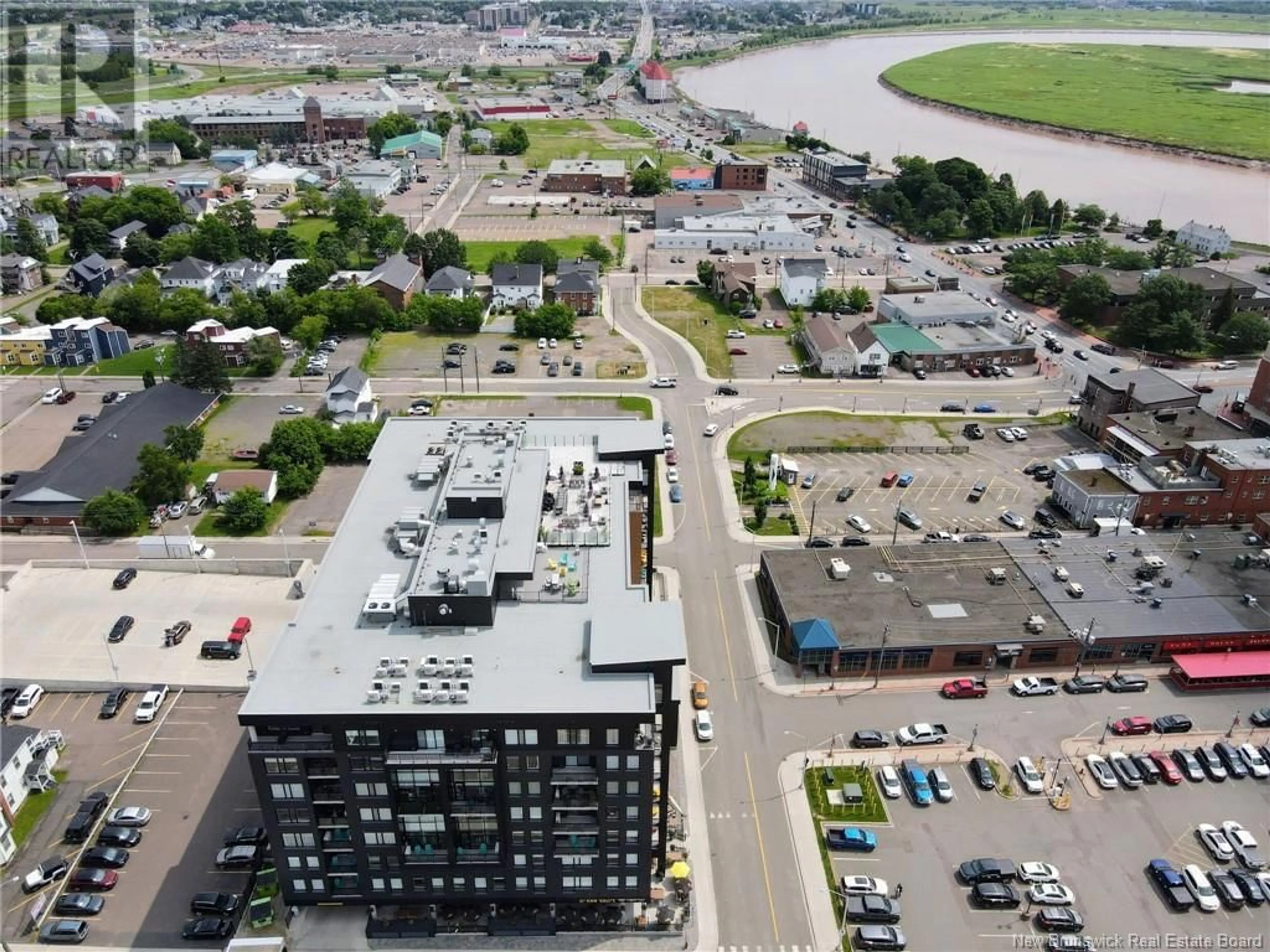 A pic from outside/outdoor area/front of a property/back of a property/a pic from drone, unknown for 609 - 55 QUEEN, Moncton New Brunswick E1C1K2