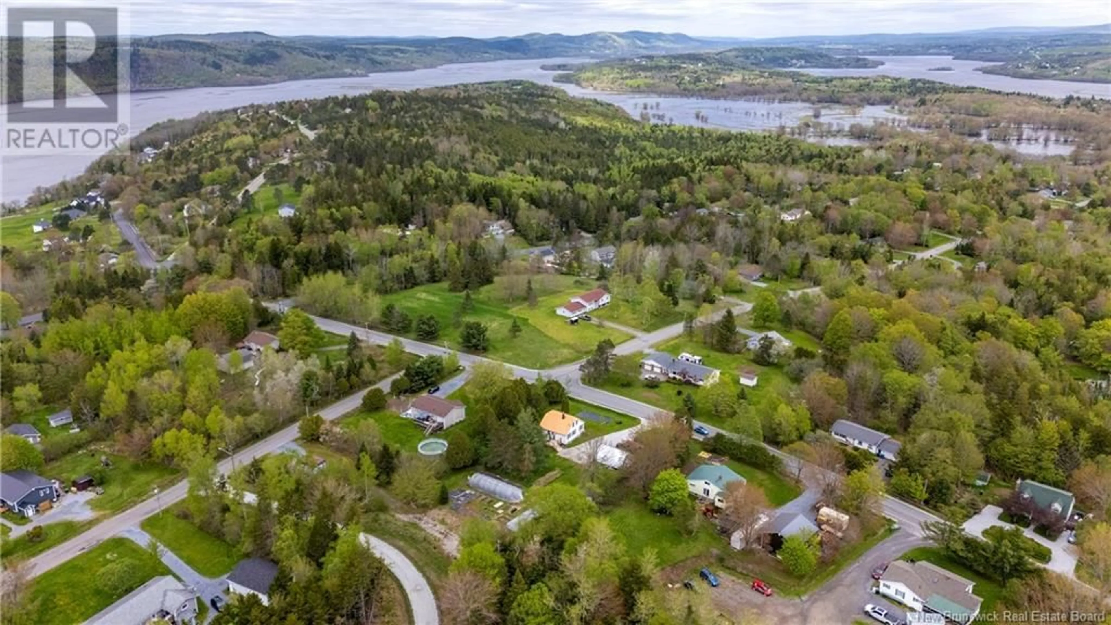 A pic from outside/outdoor area/front of a property/back of a property/a pic from drone, water/lake/river/ocean view for 245 HAMMOND RIVER ROAD, Quispamsis New Brunswick E2G1G7