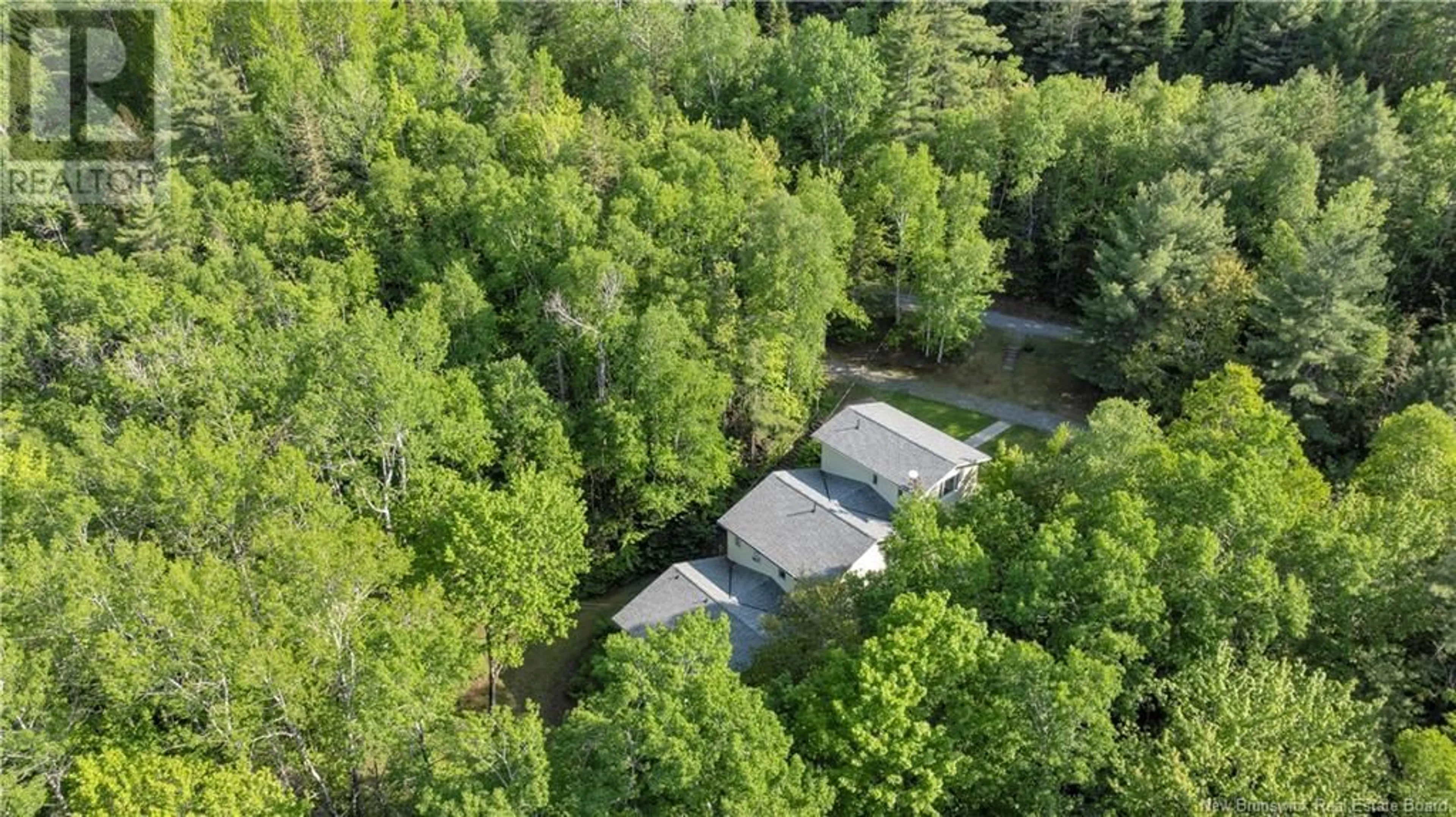 A pic from outside/outdoor area/front of a property/back of a property/a pic from drone, forest/trees view for 7415 ROUTE 101, Wirral New Brunswick E5K4E3