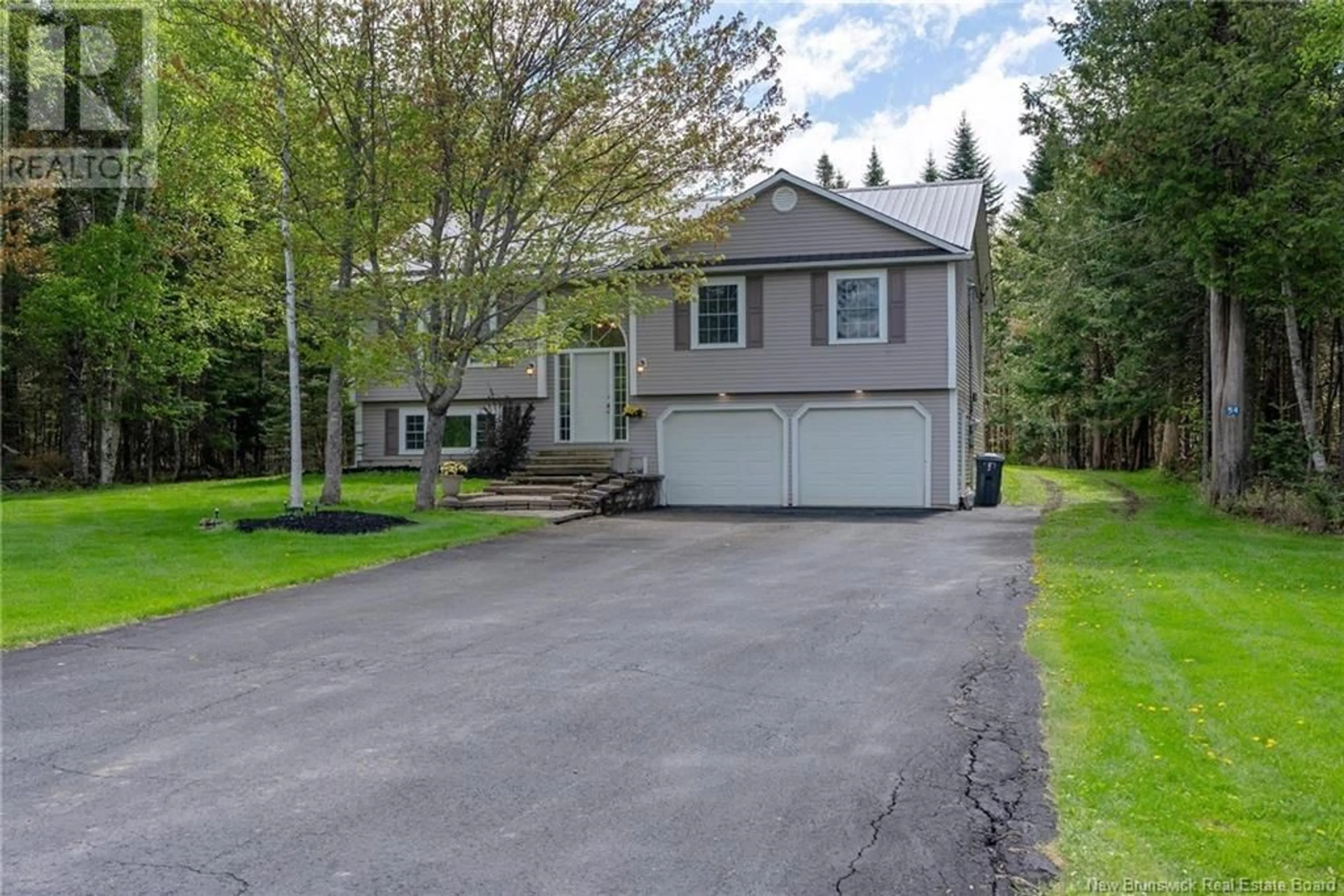 A pic from outside/outdoor area/front of a property/back of a property/a pic from drone, street for 54 KATIE AVENUE, Douglas New Brunswick E3G9K9