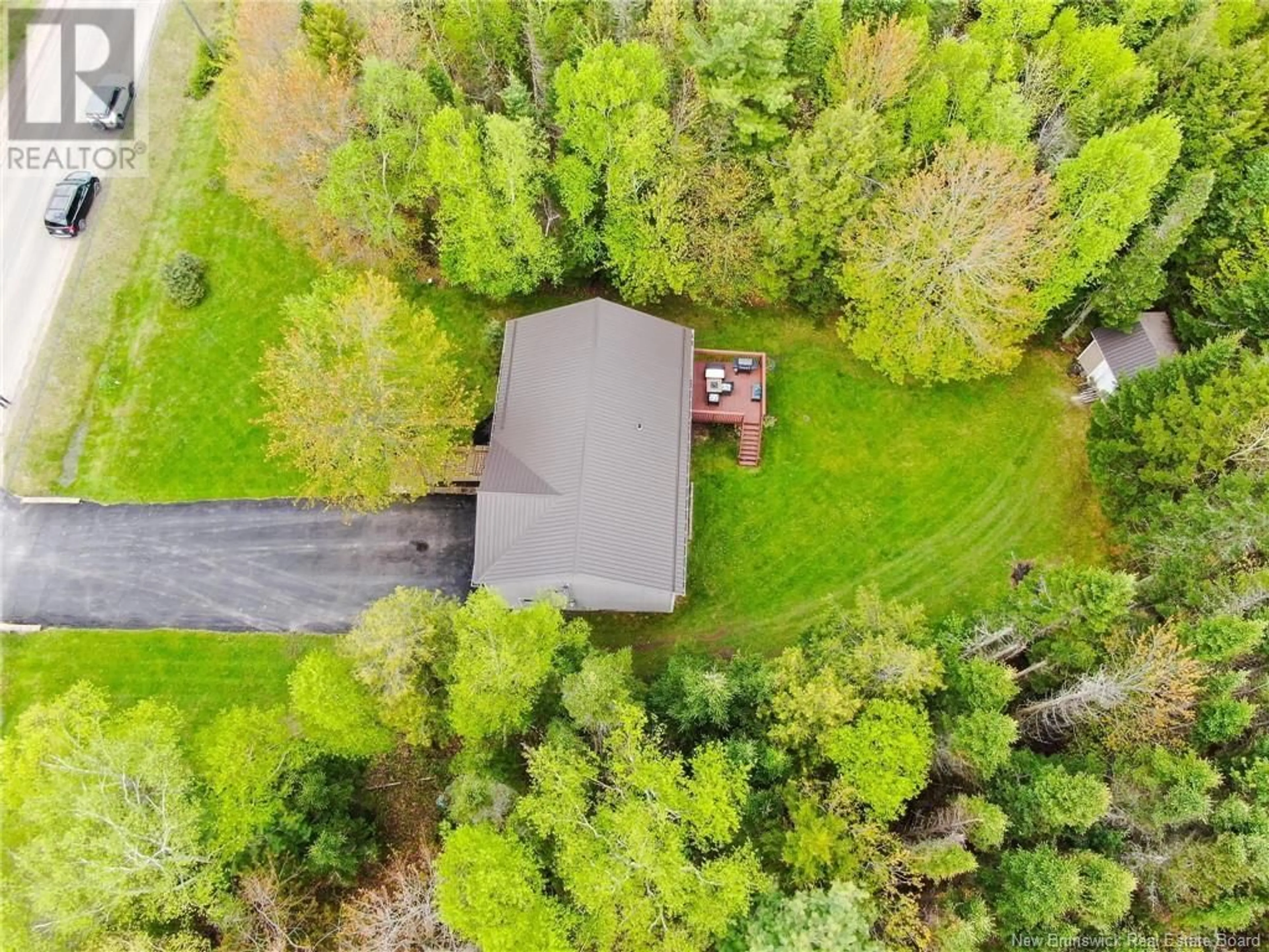 A pic from outside/outdoor area/front of a property/back of a property/a pic from drone, forest/trees view for 54 KATIE AVENUE, Douglas New Brunswick E3G9K9