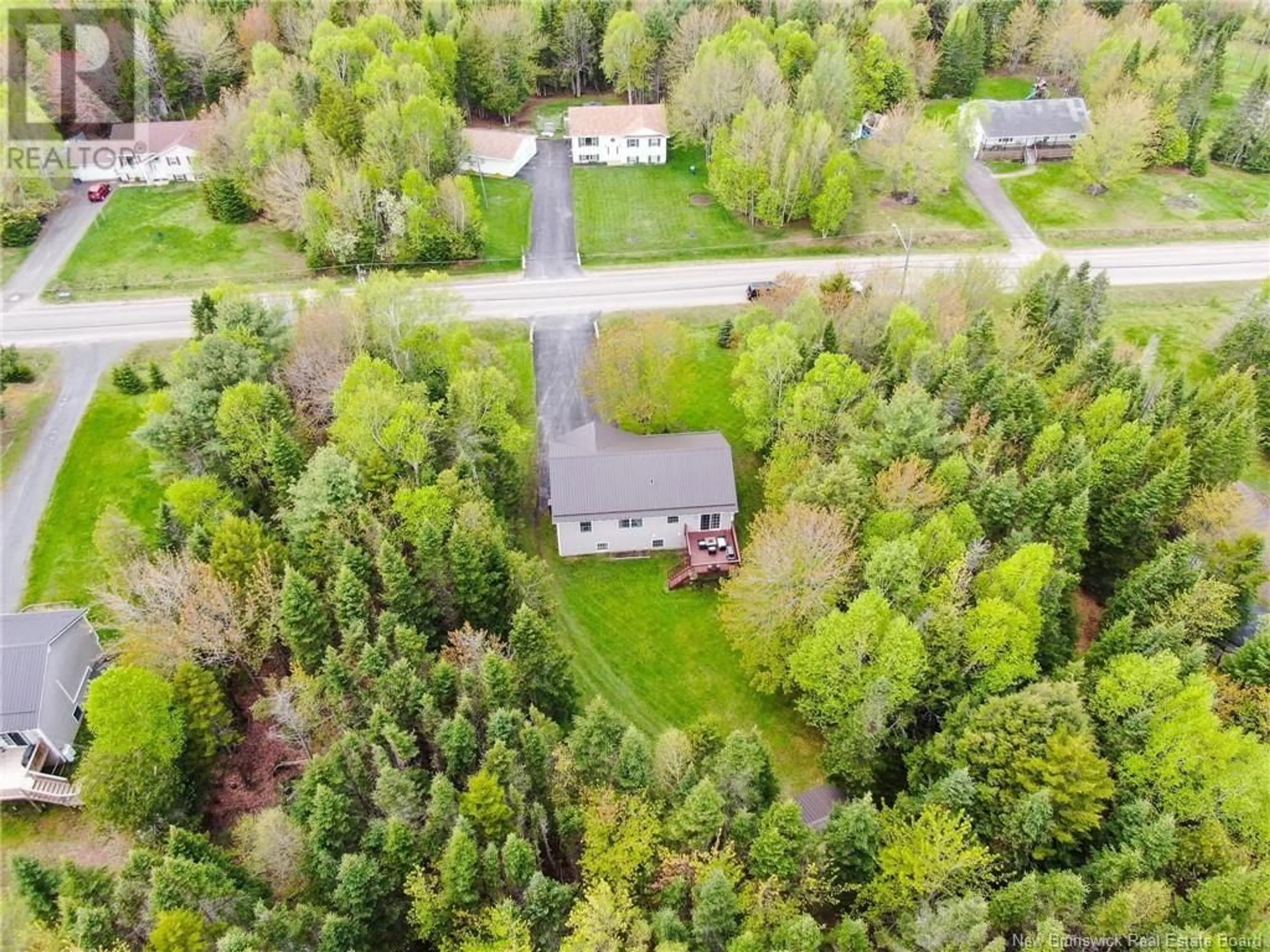 A pic from outside/outdoor area/front of a property/back of a property/a pic from drone, forest/trees view for 54 KATIE AVENUE, Douglas New Brunswick E3G9K9