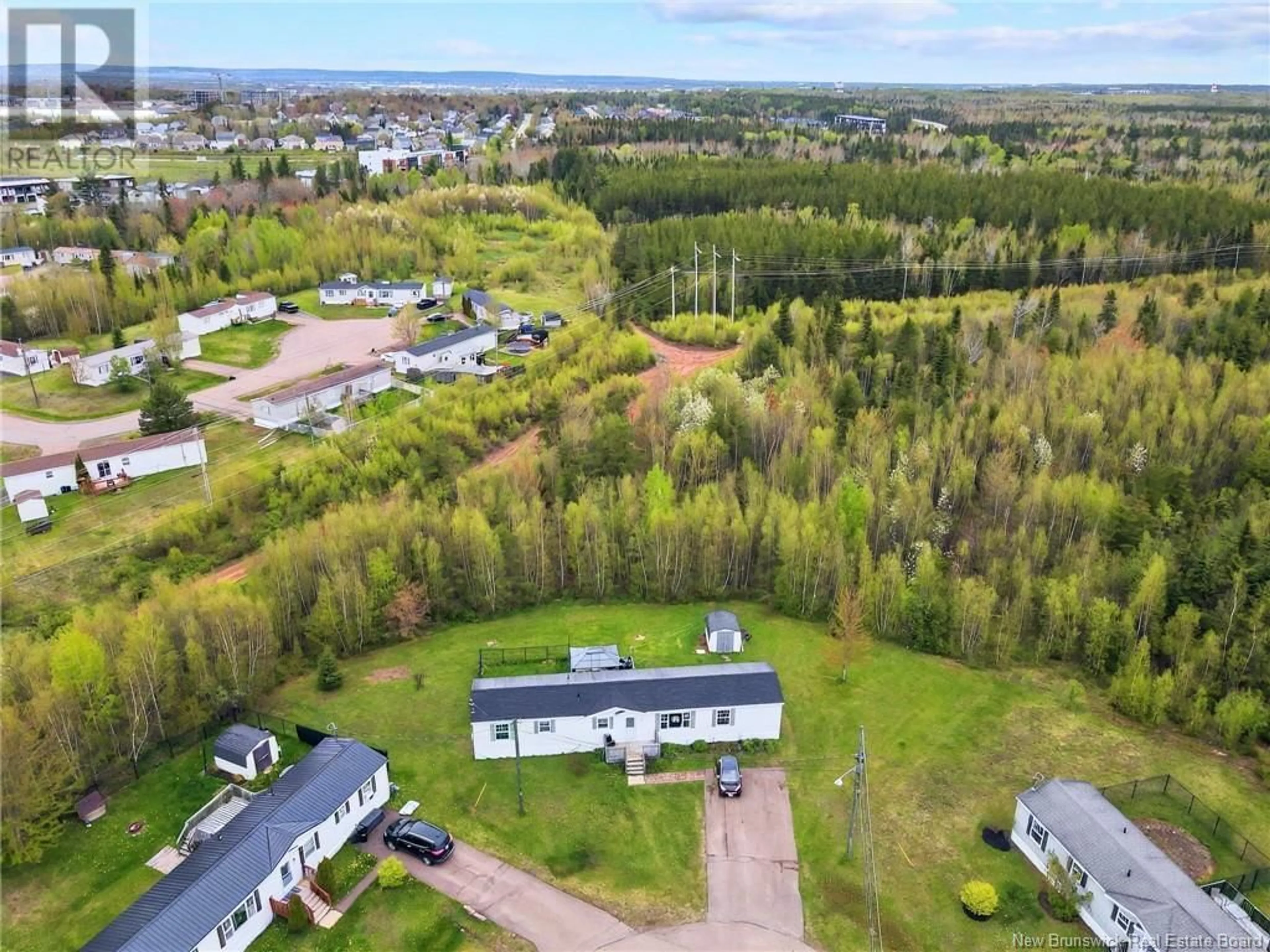 A pic from outside/outdoor area/front of a property/back of a property/a pic from drone, unknown for 5 DARTMOUTH COURT, Riverview New Brunswick E1B5R3