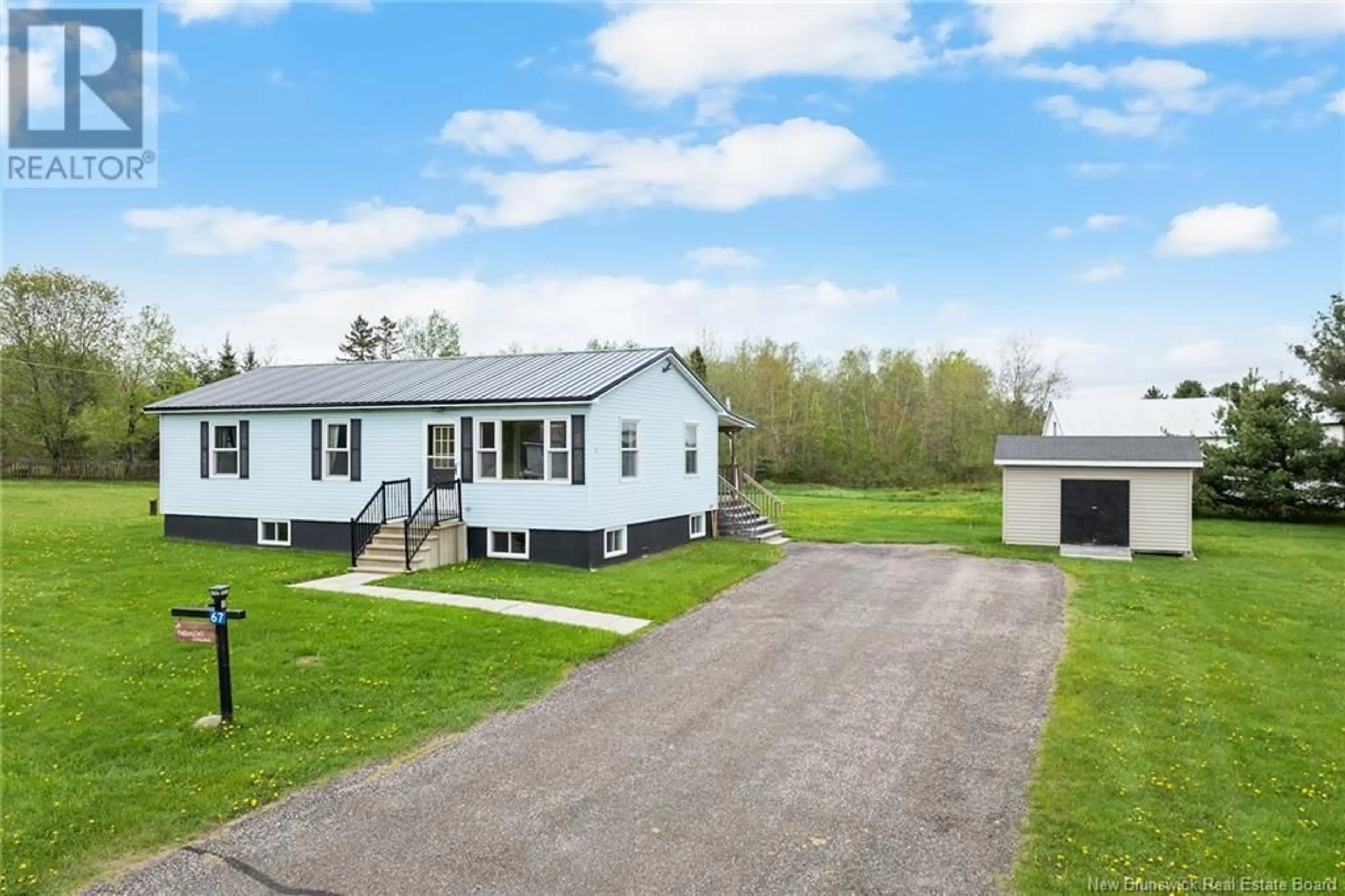 A pic from outside/outdoor area/front of a property/back of a property/a pic from drone, street for 67 WILLOW AVENUE, Tracy New Brunswick E5L1A1
