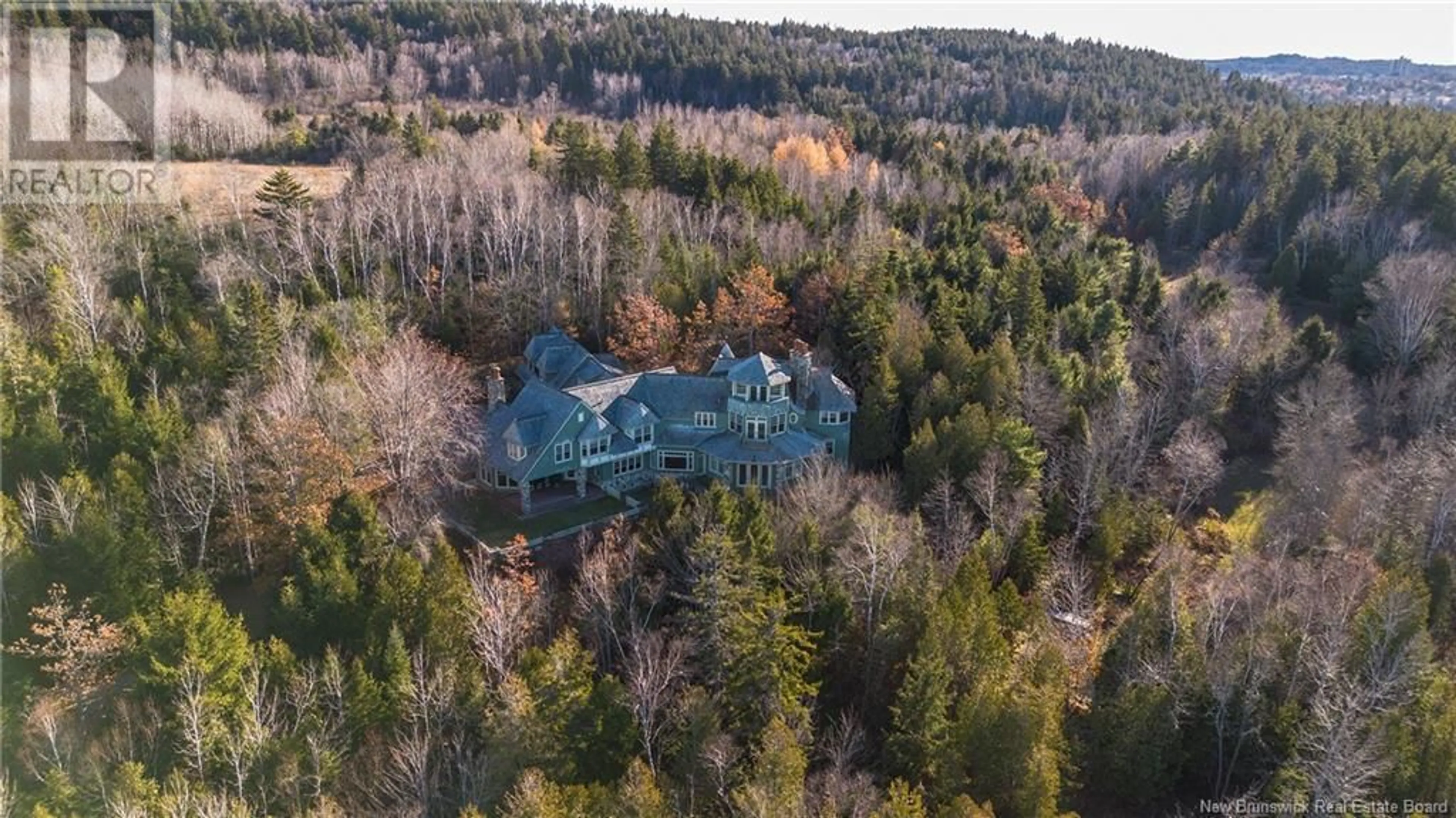 A pic from outside/outdoor area/front of a property/back of a property/a pic from drone, forest/trees view for 501 KENNEBECASIS DRIVE, Saint John New Brunswick E2K5K9