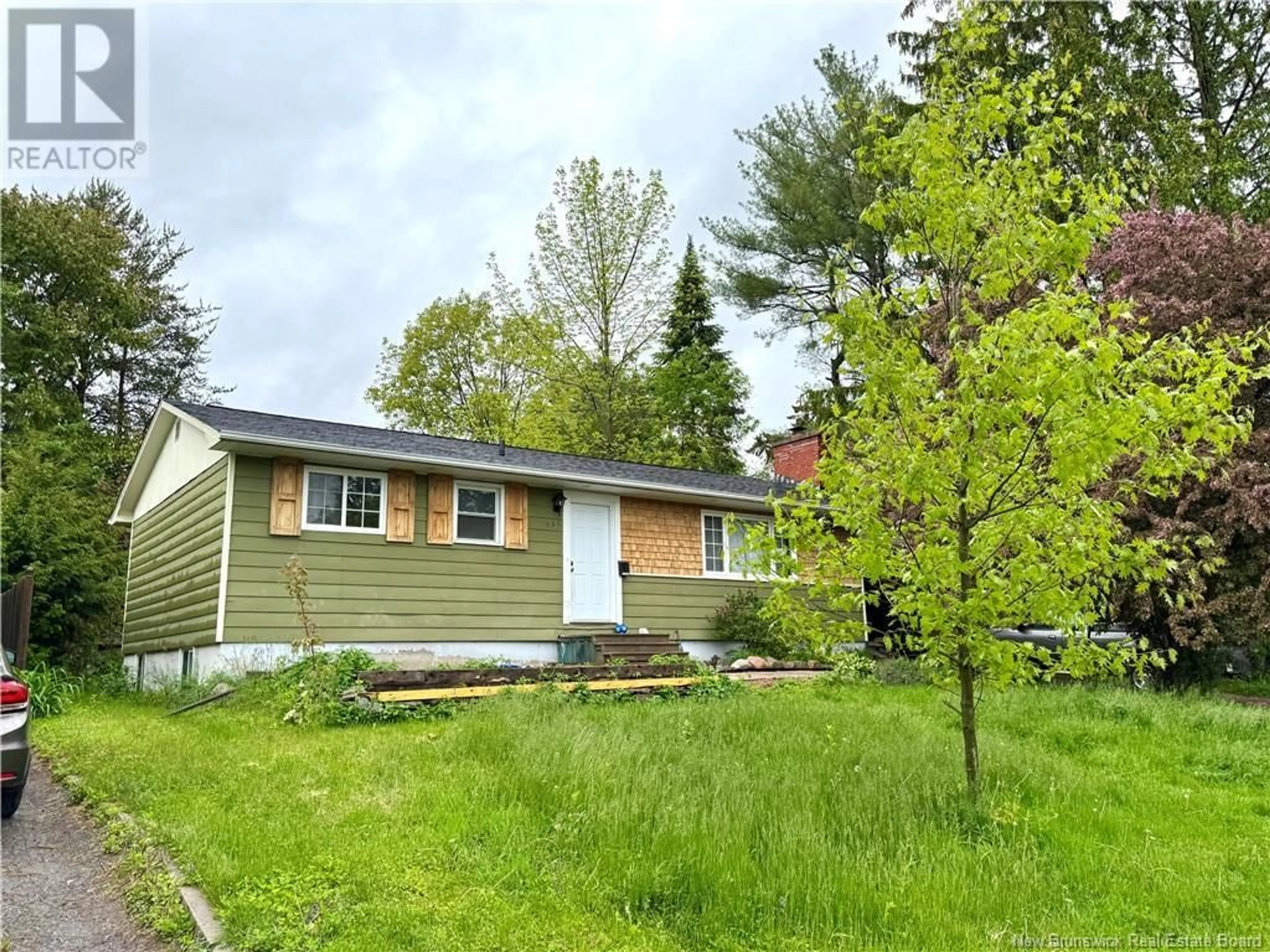 Home with vinyl exterior material, street for 127 MELVIN STREET, Fredericton New Brunswick E3A2M9